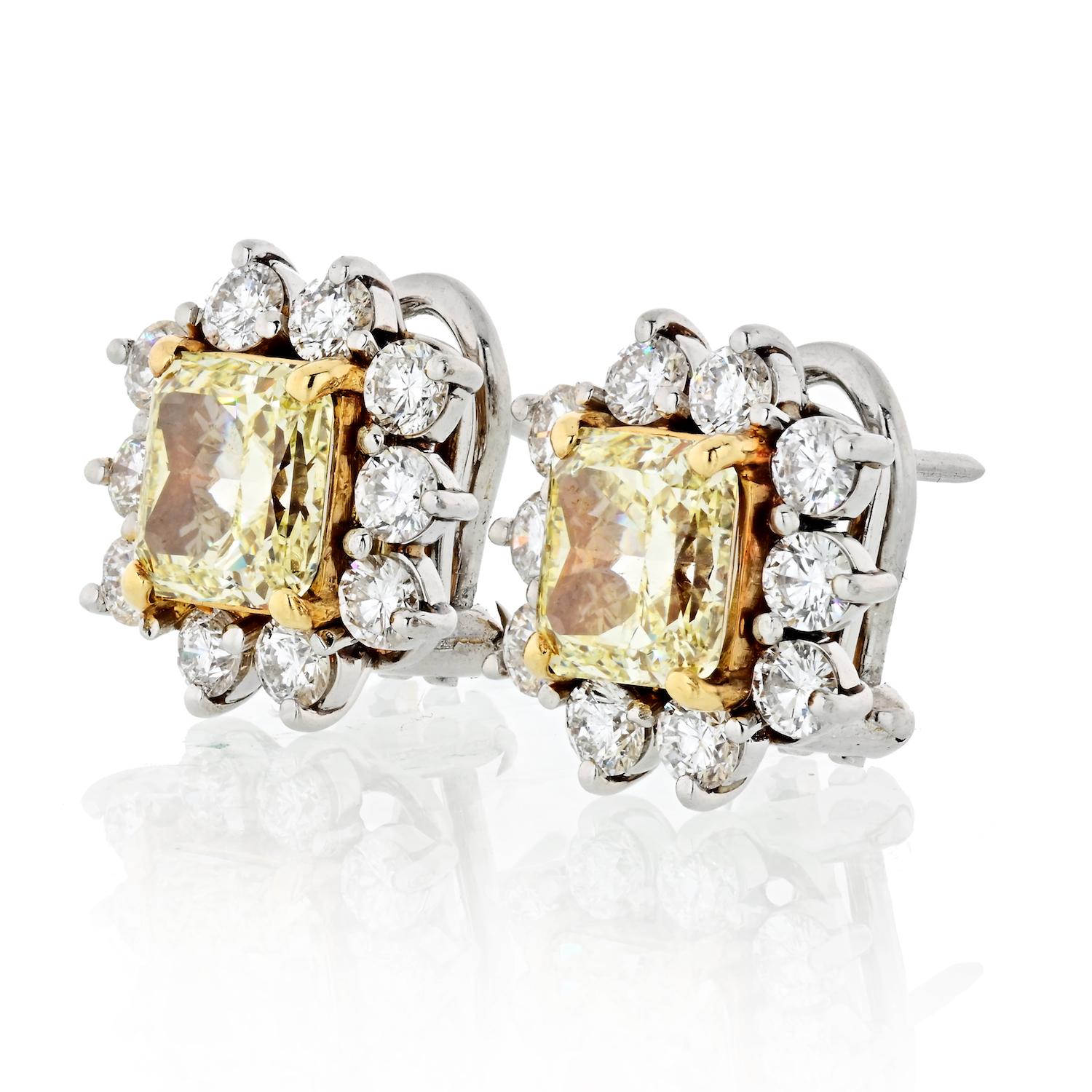 An exceptional matched pair of fancy yellow radiant cut diamonds weighing 3.74 carat total. The gemological institute of America certificate states the diamonds are natural fancy color and VVS1 and VVS2 clarity. Colored diamonds that match in both