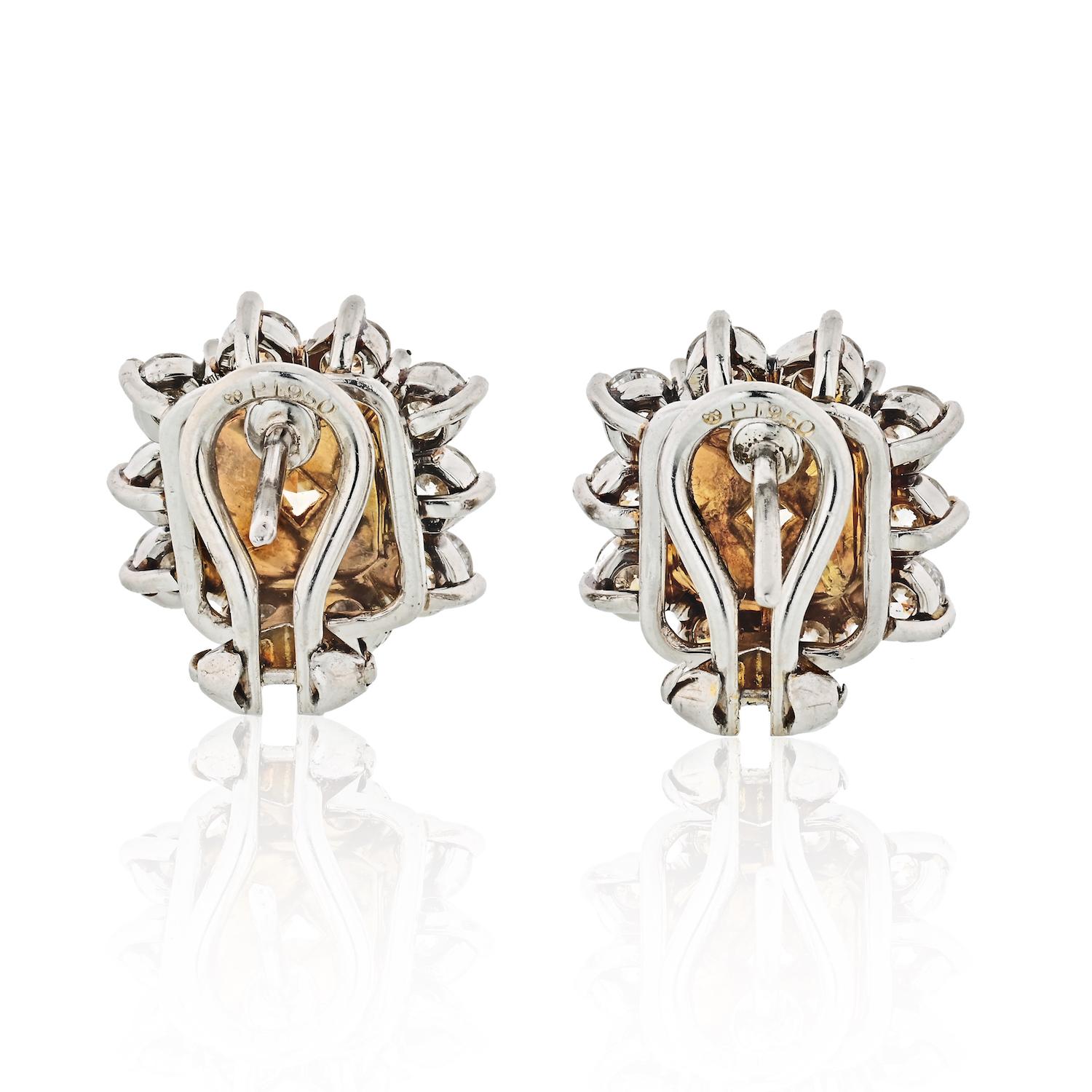 3.74 Carat Fancy Yellow Radiant Cut Halo Set Diamond Stud Earrings In New Condition In New York, NY