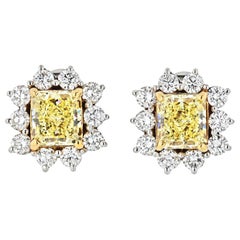 3.74 Carat Fancy Yellow Radiant Cut Halo Set Diamond Stud Earrings