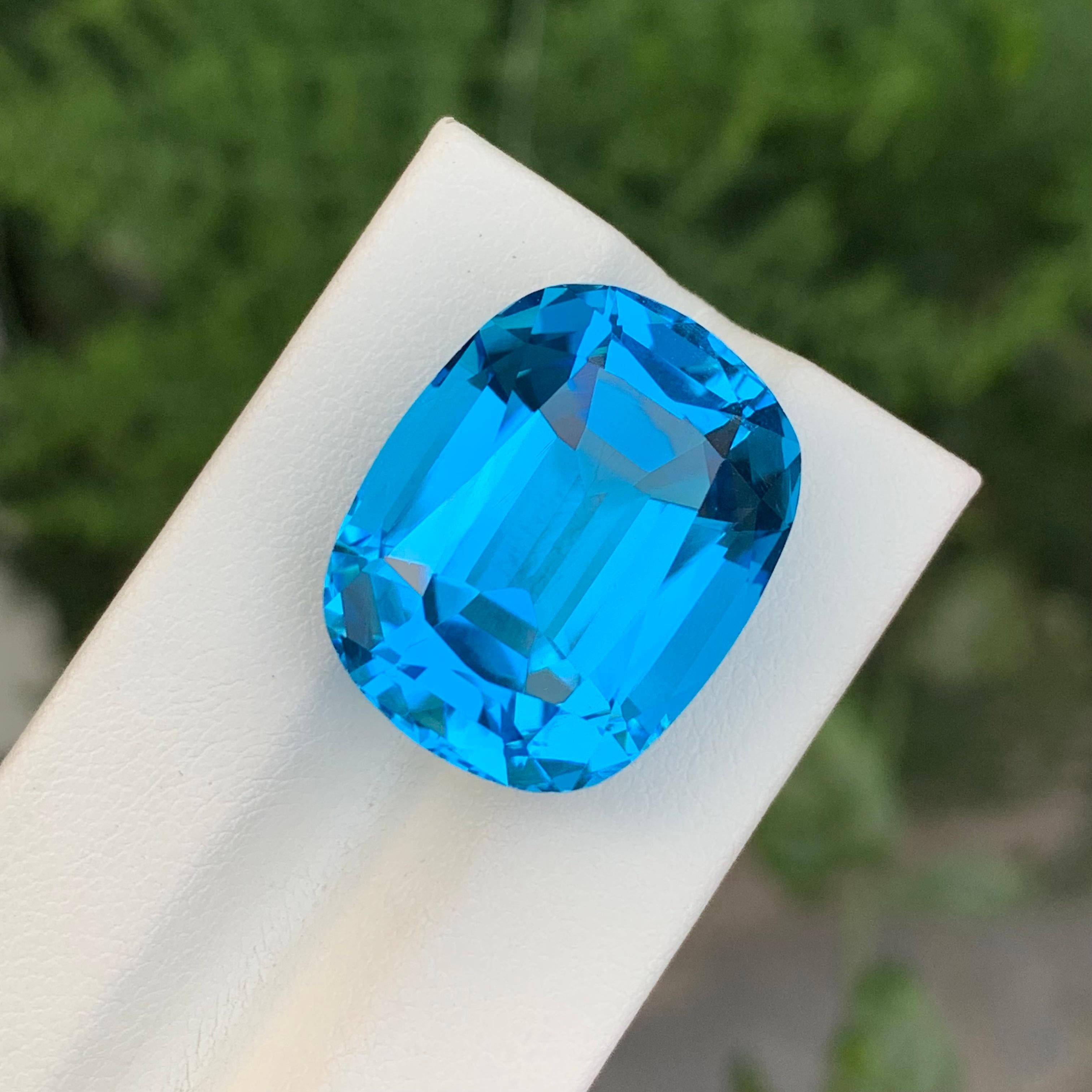 Arts and Crafts 37.45 Carat Gorgeous Faceted Electric Blue Topaz Cushion Shape Gem For Sale
