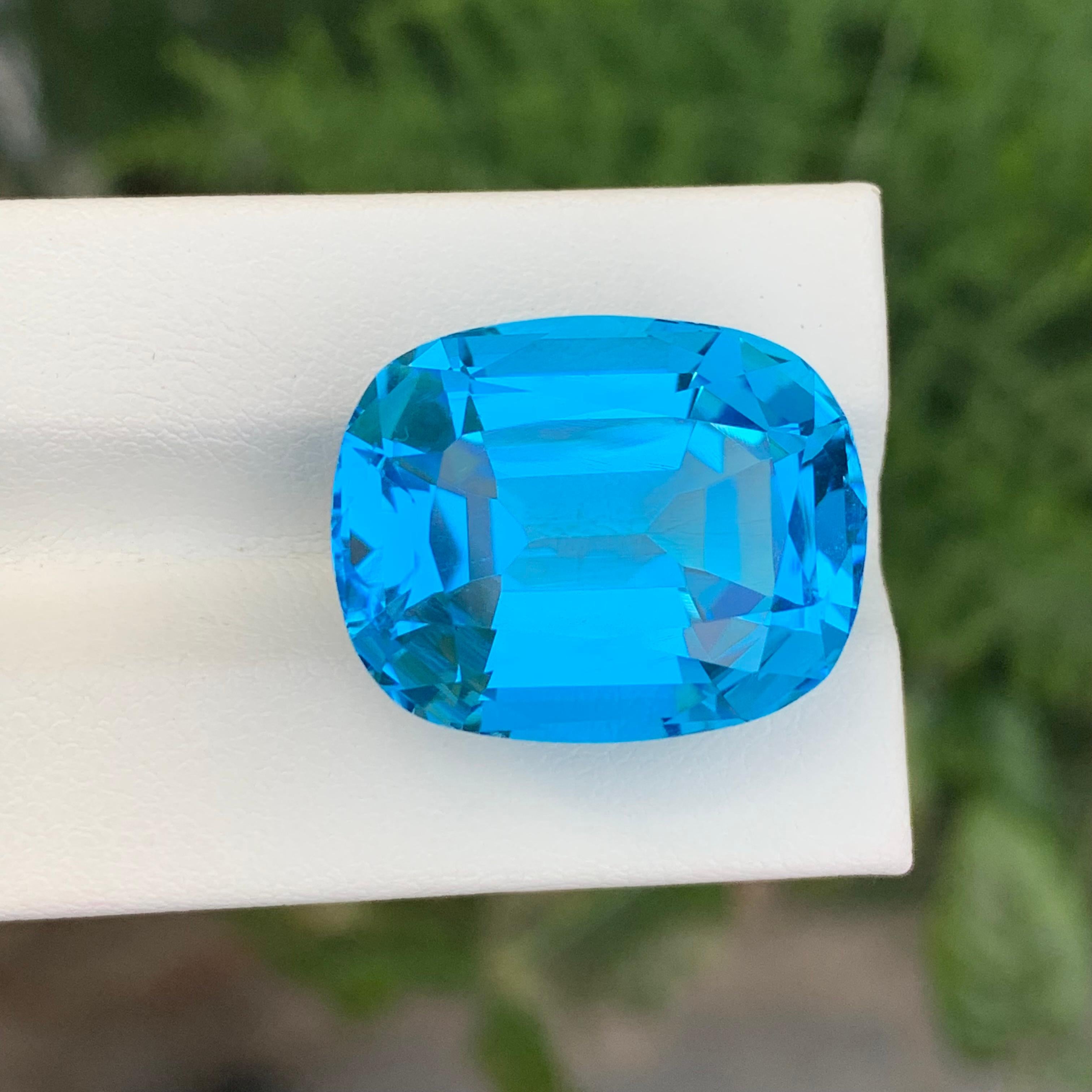 Cushion Cut 37.45 Carat Gorgeous Faceted Electric Blue Topaz Cushion Shape Gem For Sale