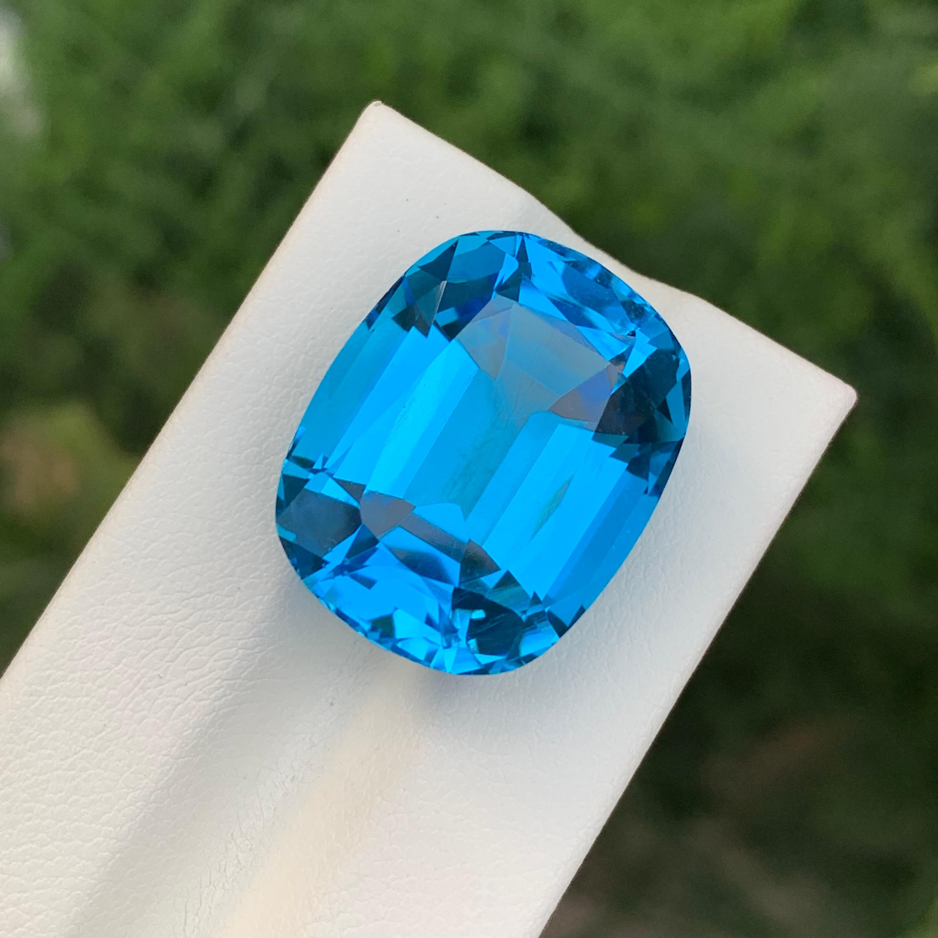 37.45 Carat Gorgeous Faceted Electric Blue Topaz Cushion Shape Gem In New Condition For Sale In Peshawar, PK
