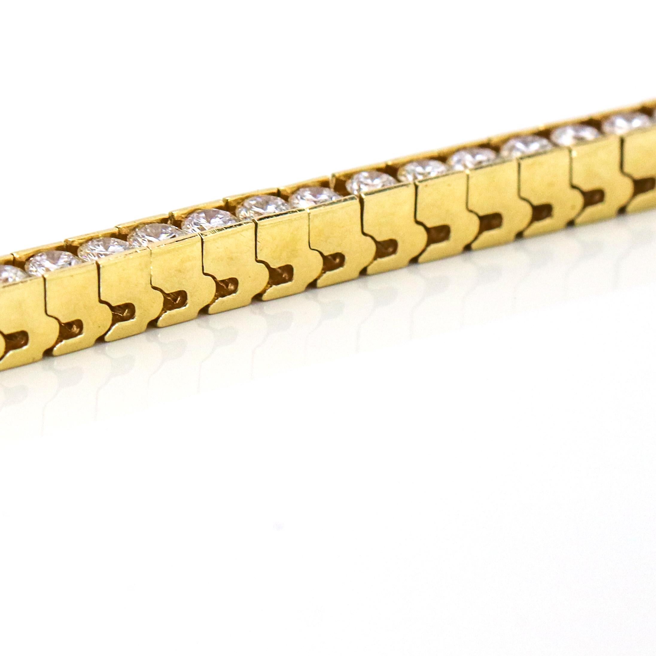 3.75 Carat 14 Karat Yellow Gold Channel Set Diamond Tennis Bracelet In Good Condition For Sale In Fort Lauderdale, FL