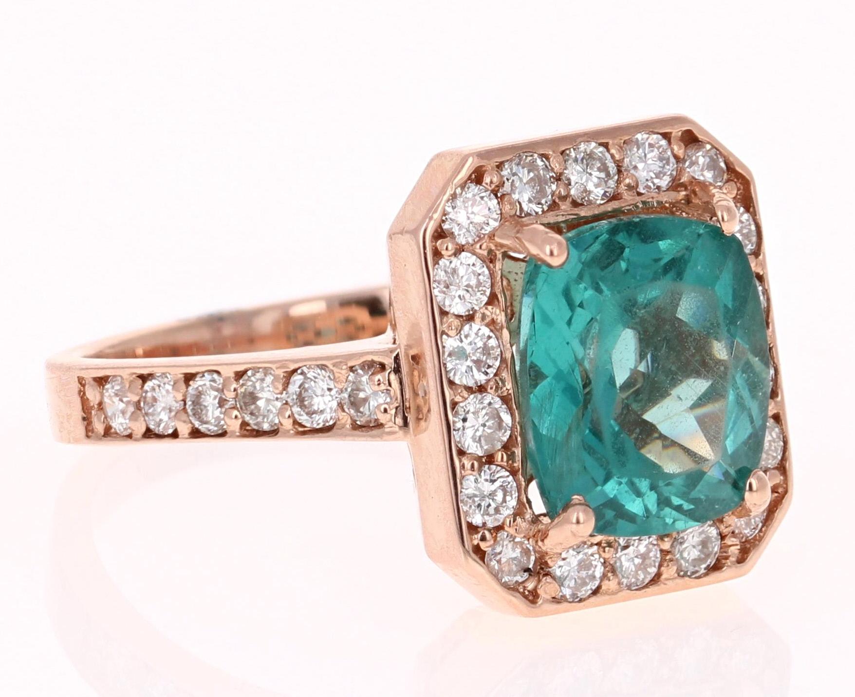 An Apatite Ring set beautifully in Rose Gold - such a beautiful and unique combination!!

This stunning Apatite and Diamond Ring can easily transform into a unique and classy engagement ring for your special someone!  The ring has a 3.01 Carat