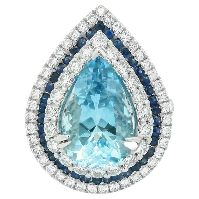 Bague en or blanc 18 carats avec aigue-marine, diamants et saphirs