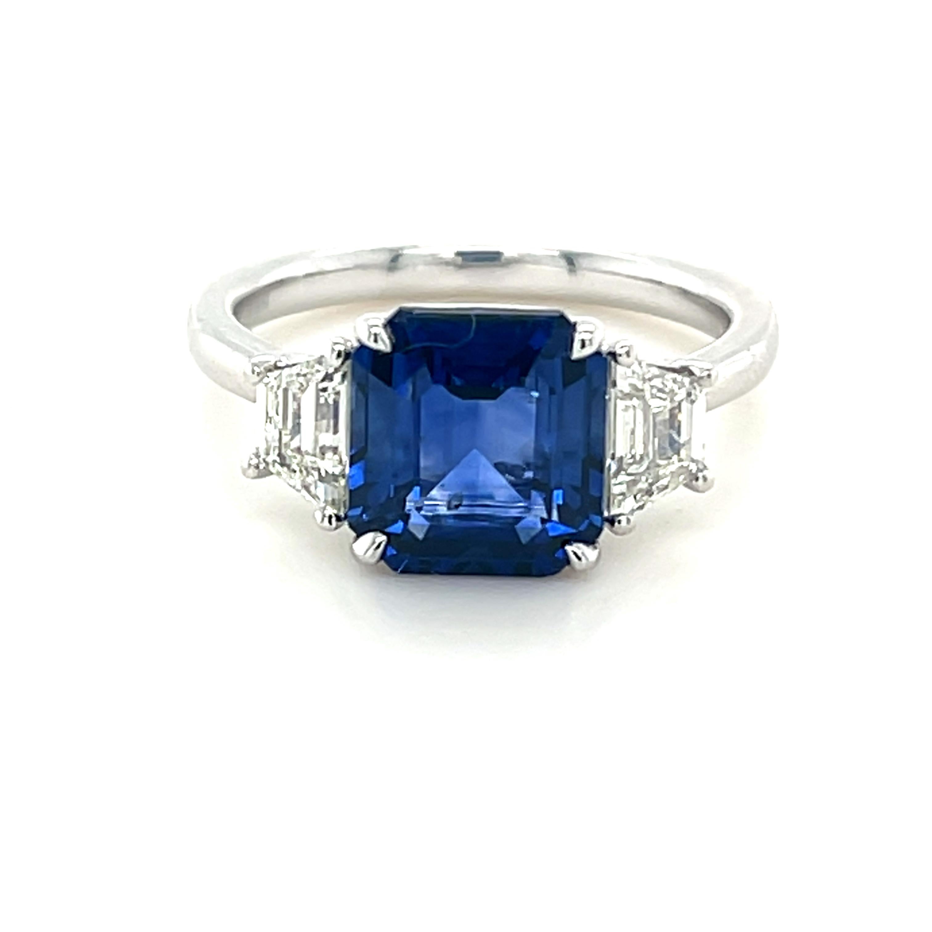 3.75 Carat Emerald Cut Ceylon Sapphire & Diamond Three Stone Ring in Platinum In New Condition For Sale In Great Neck, NY
