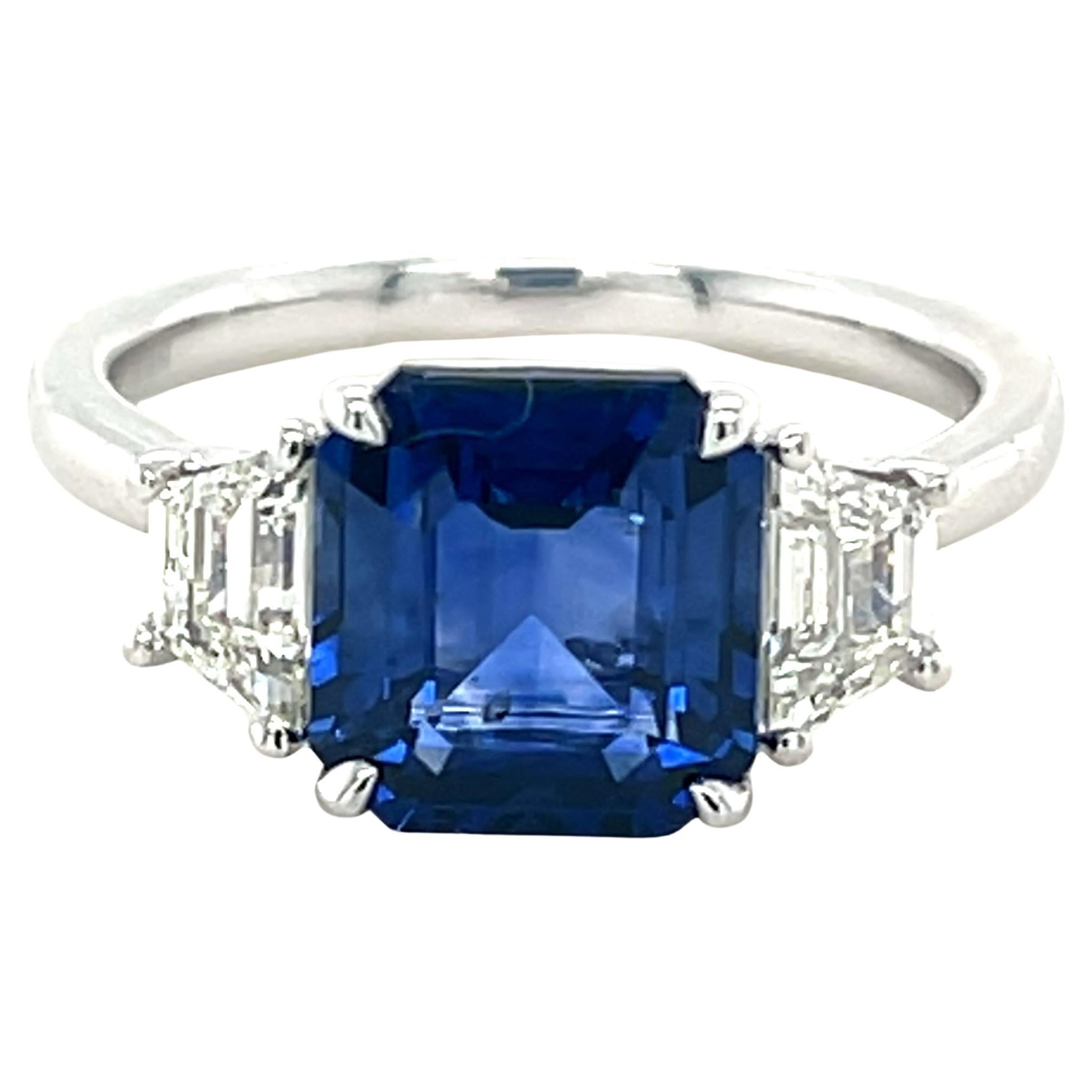 3.75 Carat Emerald Cut Ceylon Sapphire & Diamond Three Stone Ring in Platinum