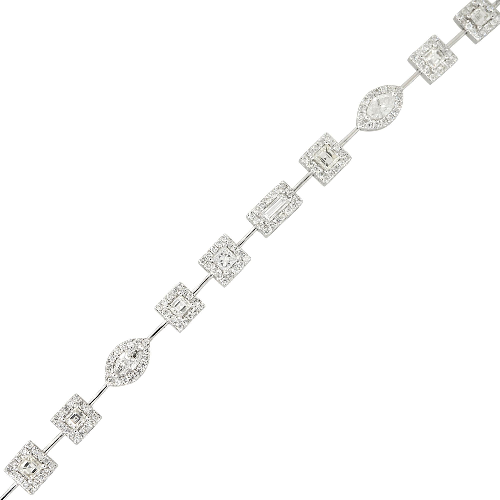 18k White Gold 3.75ctw Multi-Shape Diamond Halo Bracelet
Material: 18k White Gold
Diamond Details: Approximately 3.75ctw of Marquise, Asscher, Radiant, Emerald, and Baguette cut Diamonds. Each larger stone has a halo with smaller diamonds. There are