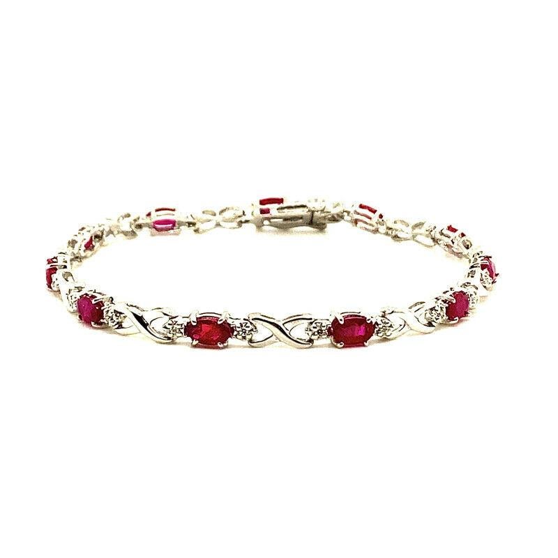 100% Natural Diamonds and Rubies
3.75CT
G-H 
SI  
14K White Gold, Prong Style
7 inches in length
0.15ct diamonds  and 3.60ct - rubies

B5963WR
ALL OUR ITEMS ARE AVAILABLE TO BE ORDERED IN 14K WHITE, ROSE OR YELLOW GOLD UPON REQUEST. All Chains of