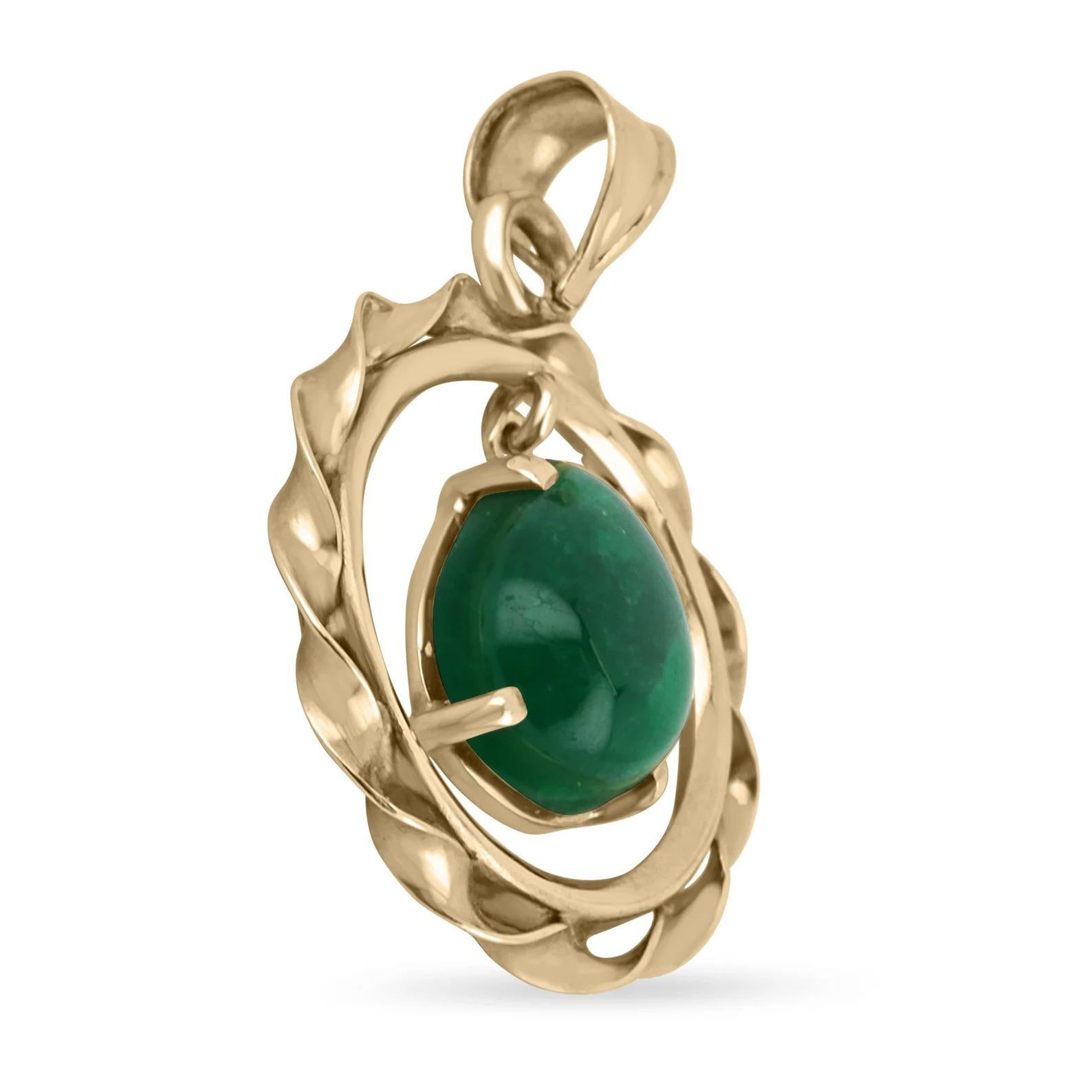 Featured here is a vintage, Colombian emerald pendant. An alluring emerald cabochon is the star center for this piece. The bright, earth-mined emerald is set in a filigree 14K yellow gold medallion-like pendant. Set with a genuine rich emerald from