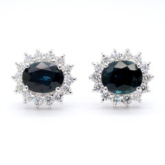 3.75 Carat Oval Blue Sapphire & 0.83 Carat Diamond Halo 18K White Gold Earrings