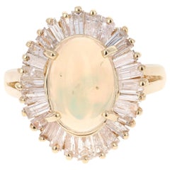 3.75 Carat Oval Cut Opal and Baguette Cut Diamond 14K Yellow Gold Ballerina Ring