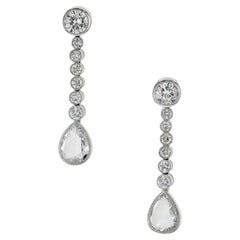 Pendants d'oreilles en goutte en platine avec diamant en forme de poire de 3,75 carats