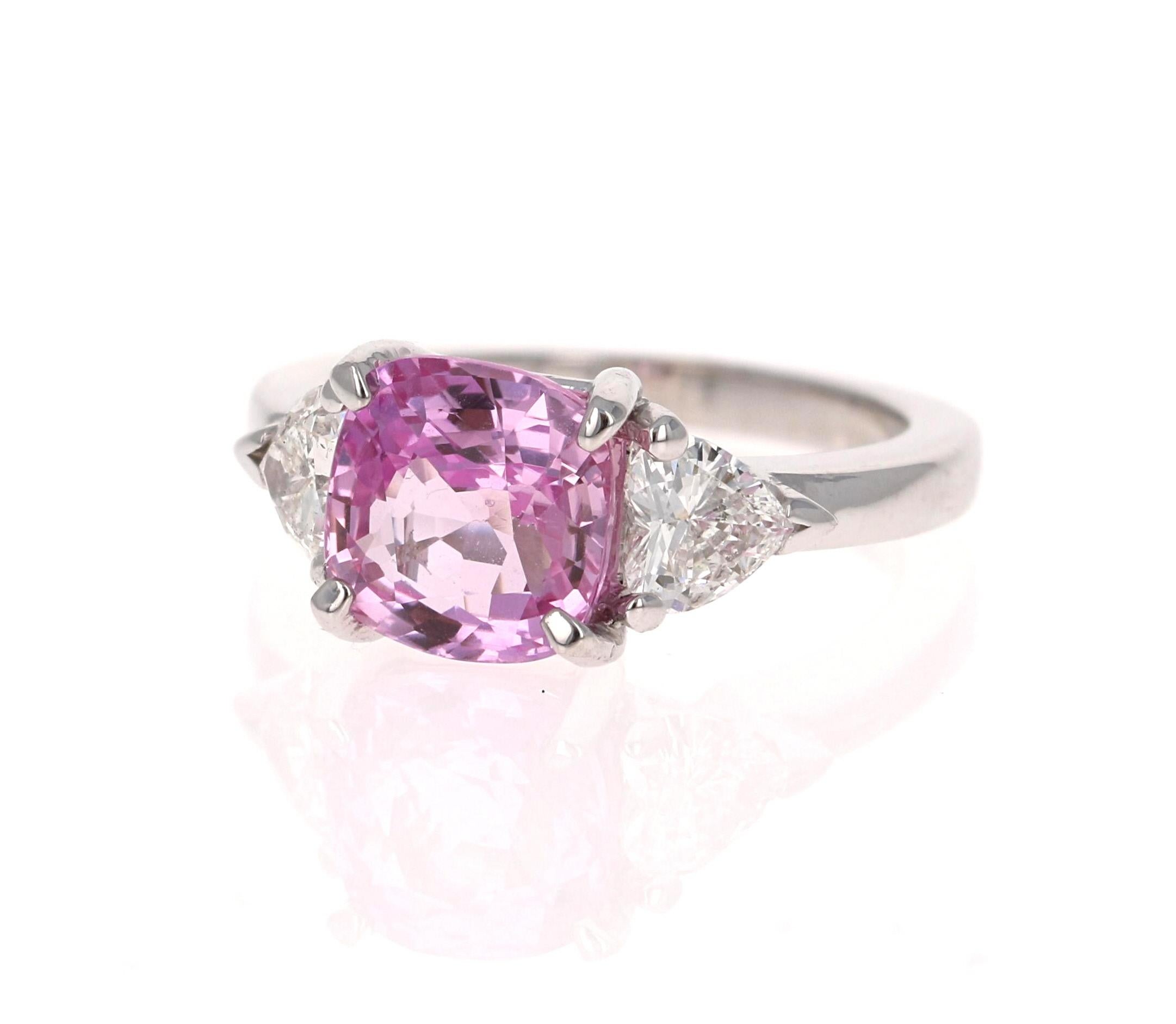 Exquisite Pink Sapphire and Diamond Ring! Can be an everyday ring or a unique Engagement Ring!

This beautiful ring has a Square-Cushion Cut Pink Sapphire that weighs 3.03 Carat. The Pink Sapphire is GIA Certified (Cert #: 6214048666 which can be