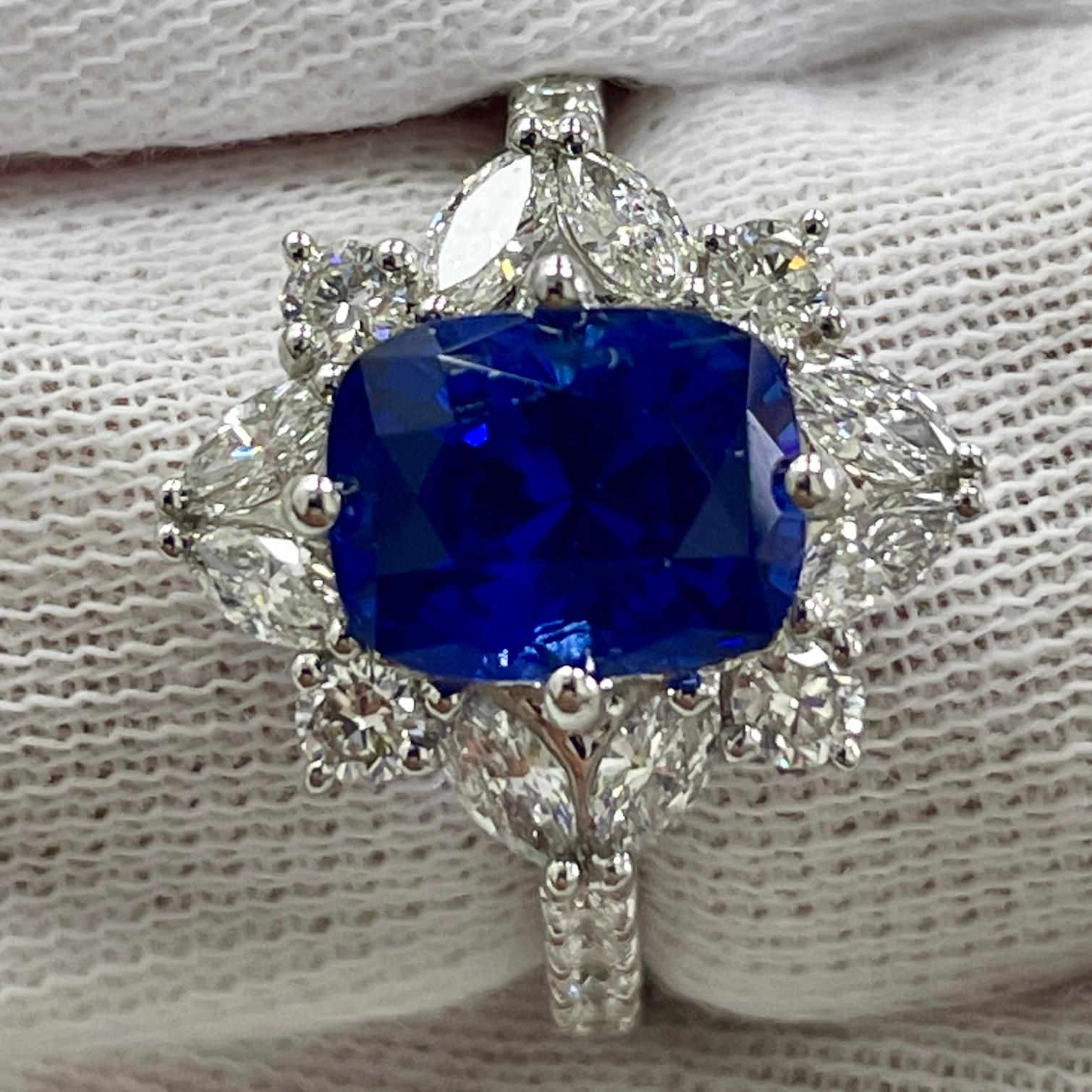 This is a LOVELY sapphire with a very lively color, mounted in an elegant 18K white gold and diamond ring with 0.93carats of brilliant white diamonds. Suitable for any occasion!
