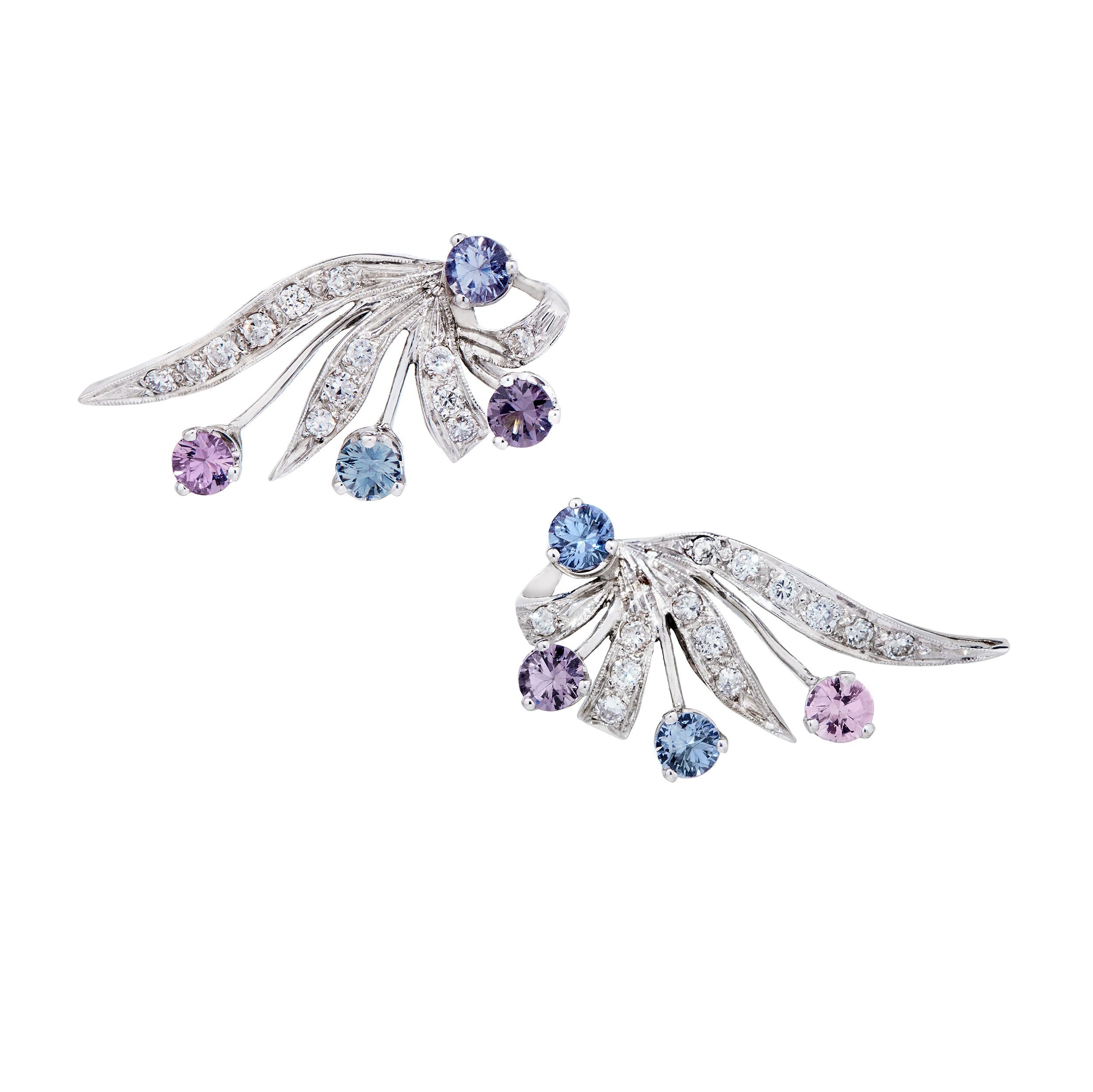 These vintage earrings have been brought to new life with the addition of soft shades of lavender Spinel peeking out from the Diamond leaves.  The earrings can be worn straight up and down, OR my personal preference, as a climber up the ear.  It's a