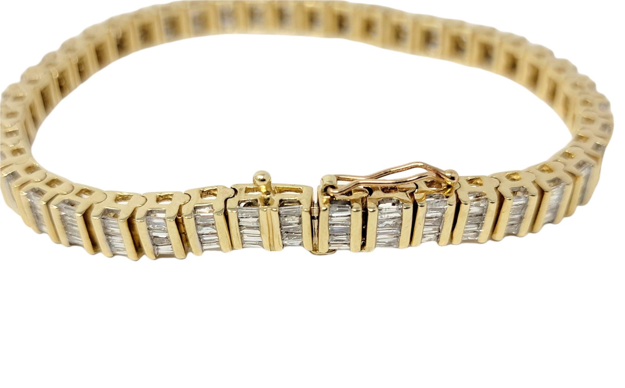 Women's 3.75 Carats Total Baguette Diamond 14 Karat Yellow Gold Bar Link Tennis Bracelet For Sale
