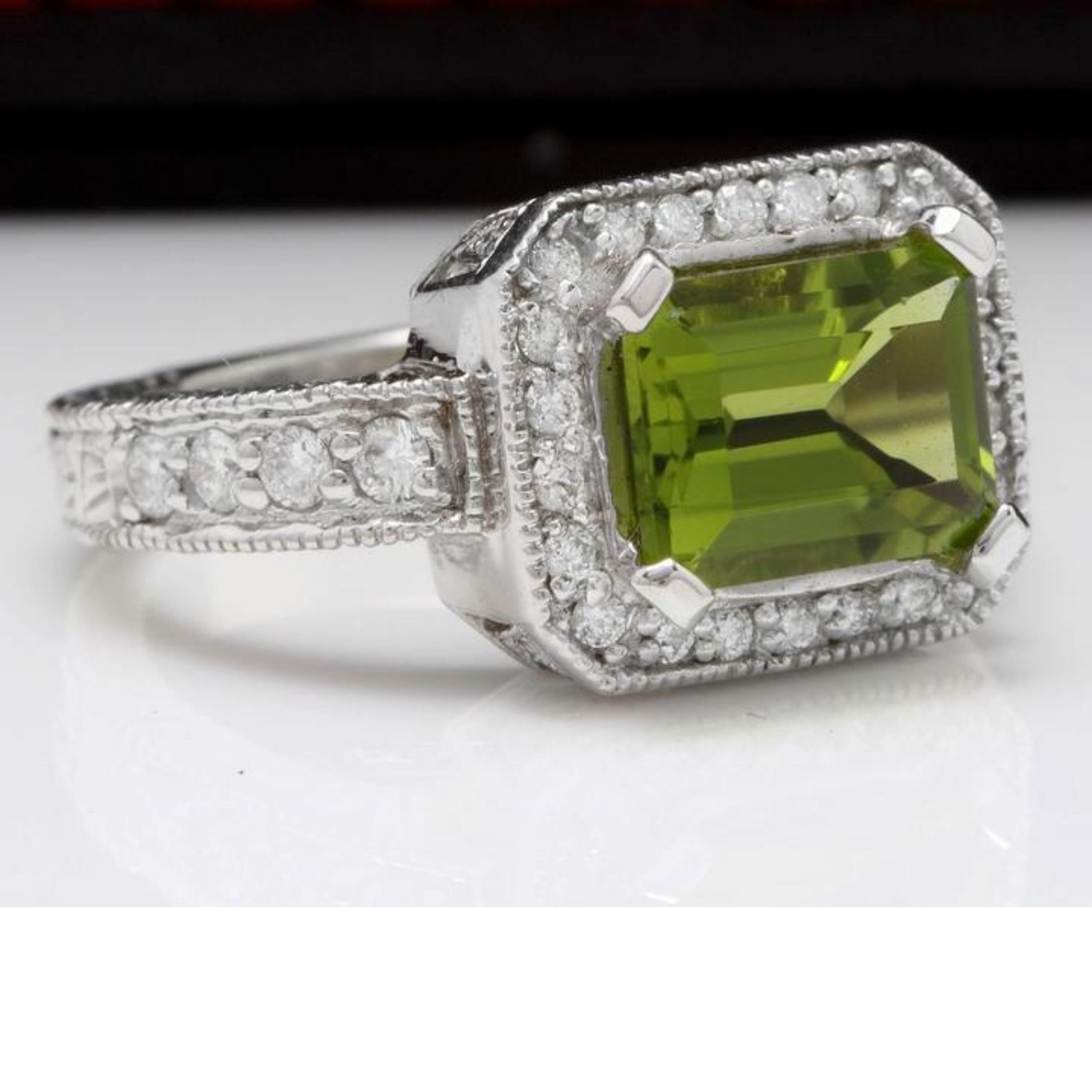 3.75 Carats Natural Very Nice Looking Peridot and Diamond 14K Solid White Gold Ring

Total Natural Emerald Cut Peridot Weight is: 3.00 Carats

Peridot Measures: 9.00 x 7.00mm

Natural Round Diamonds Weight: 0.75 Carats (color G-H / Clarity