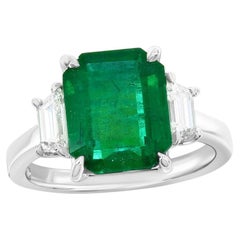 3.75 Emerald Cut Stone Ring with side Trapezoids White Gold