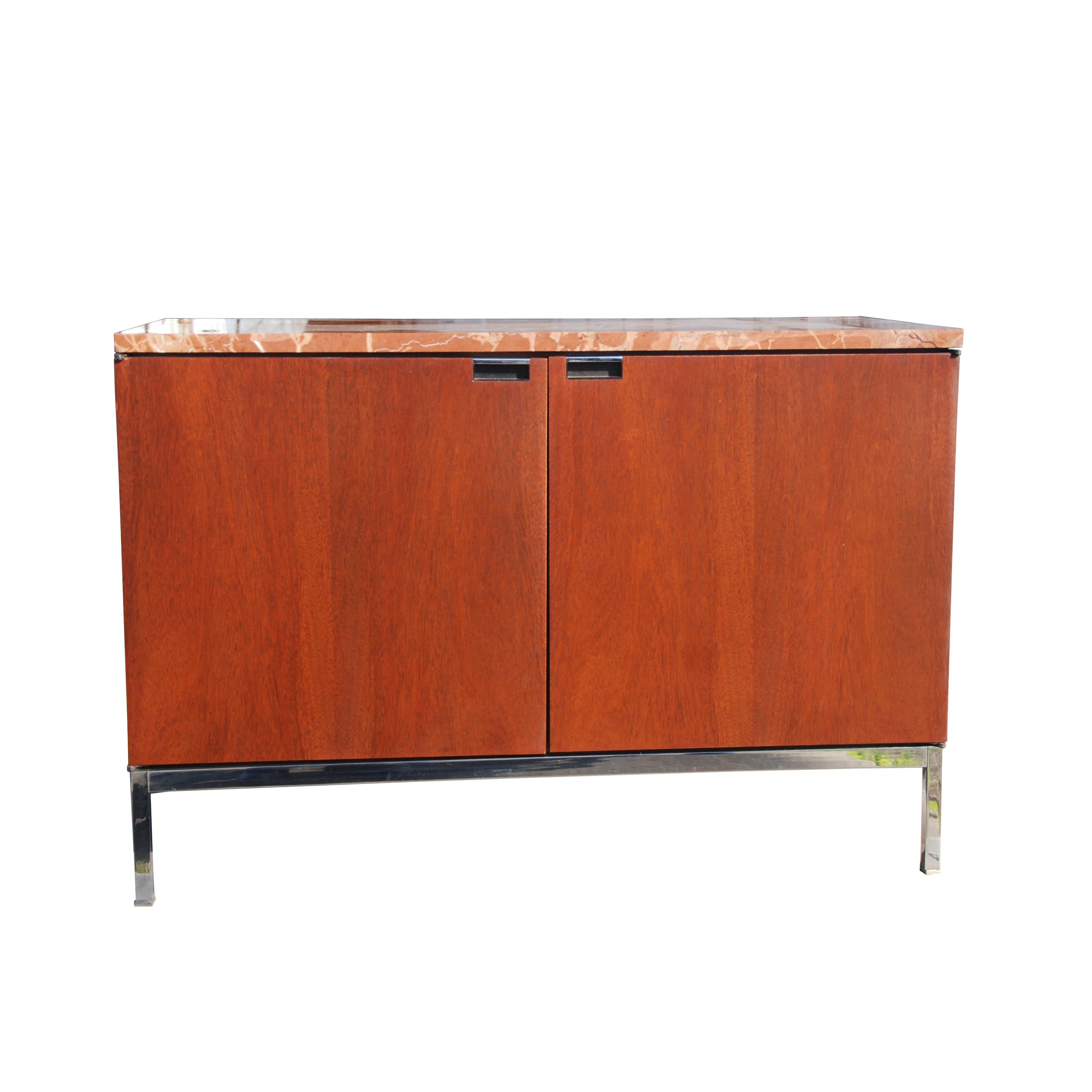 Mid-Century Modern Knoll credenza with Rojo marble top


Two hinged doors with magnetic catches

Two cabinets, each cabinet has 2 removable, adjustable shelf

Metal legs and trim



Measures: 37.5
