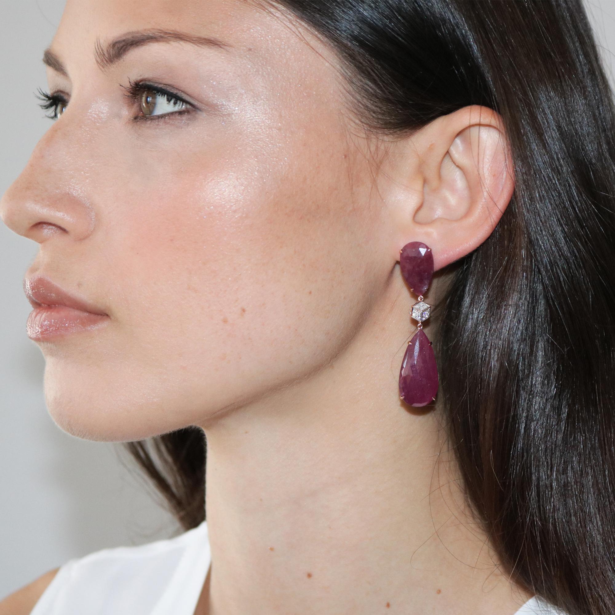 One of a kind pear shape ruby earrings with 18kt rose gold signature Brillante element with round, brilliant diamonds. 

The weight of each earring is light and will not pull down the ear and it is designed specifically for maximum comfort.

The