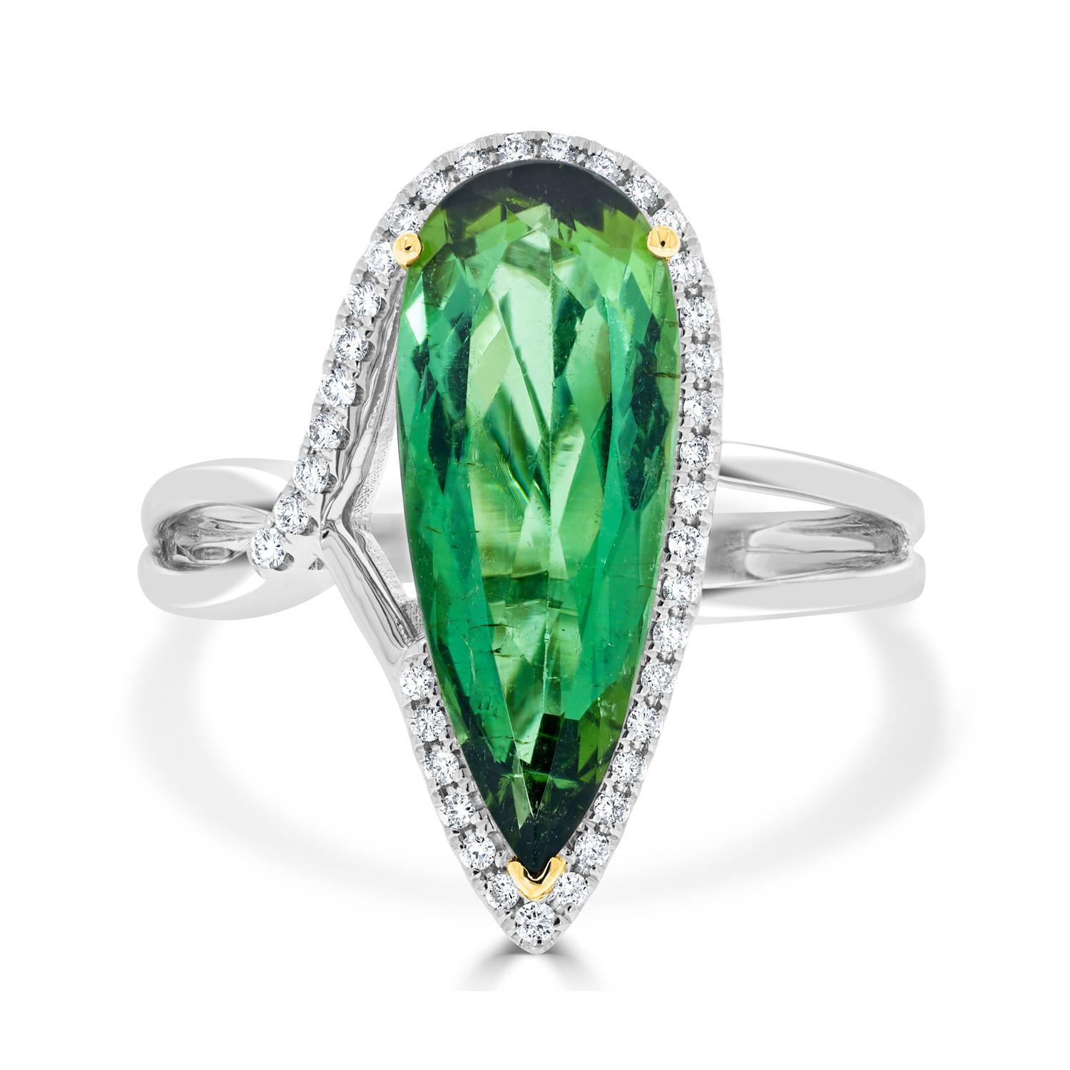 An Exquisite 3.76ct Green Tourmaline and Diamond Halo Ring

Elevate your jewelry collection with this stunning masterpiece featuring a vibrant 3.76 carat green tourmaline, masterfully cut into a captivating pear shape. This striking gemstone
