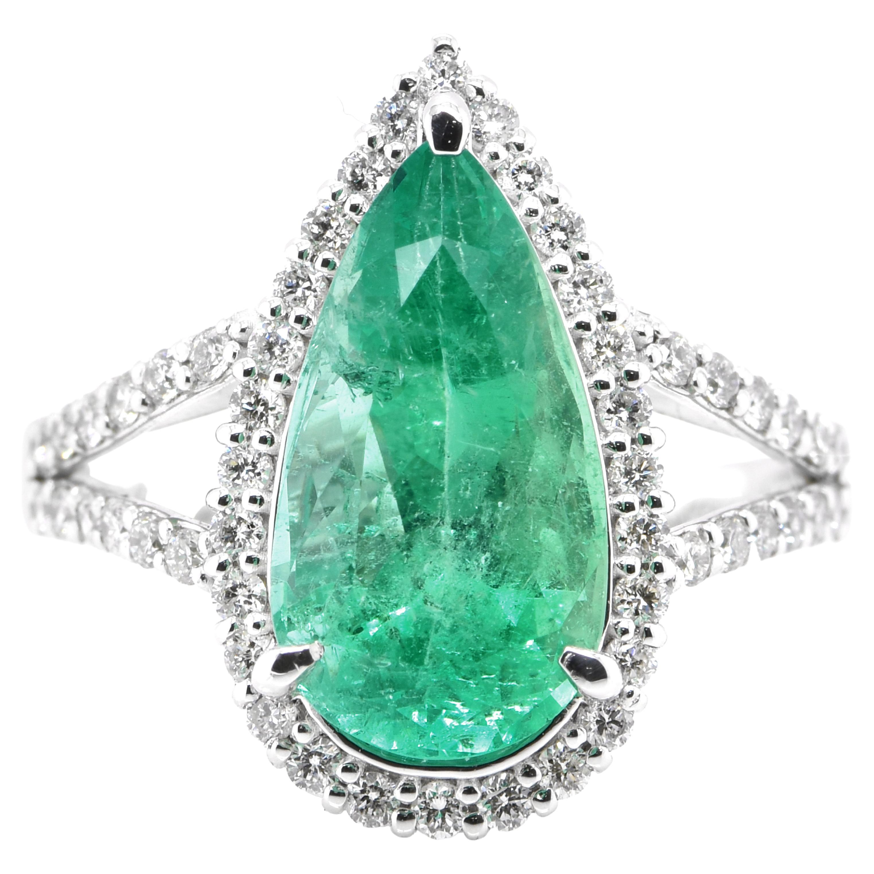 3.76 Carat Natural Pear Shape Emerald and Diamond Ring Set in Platinum