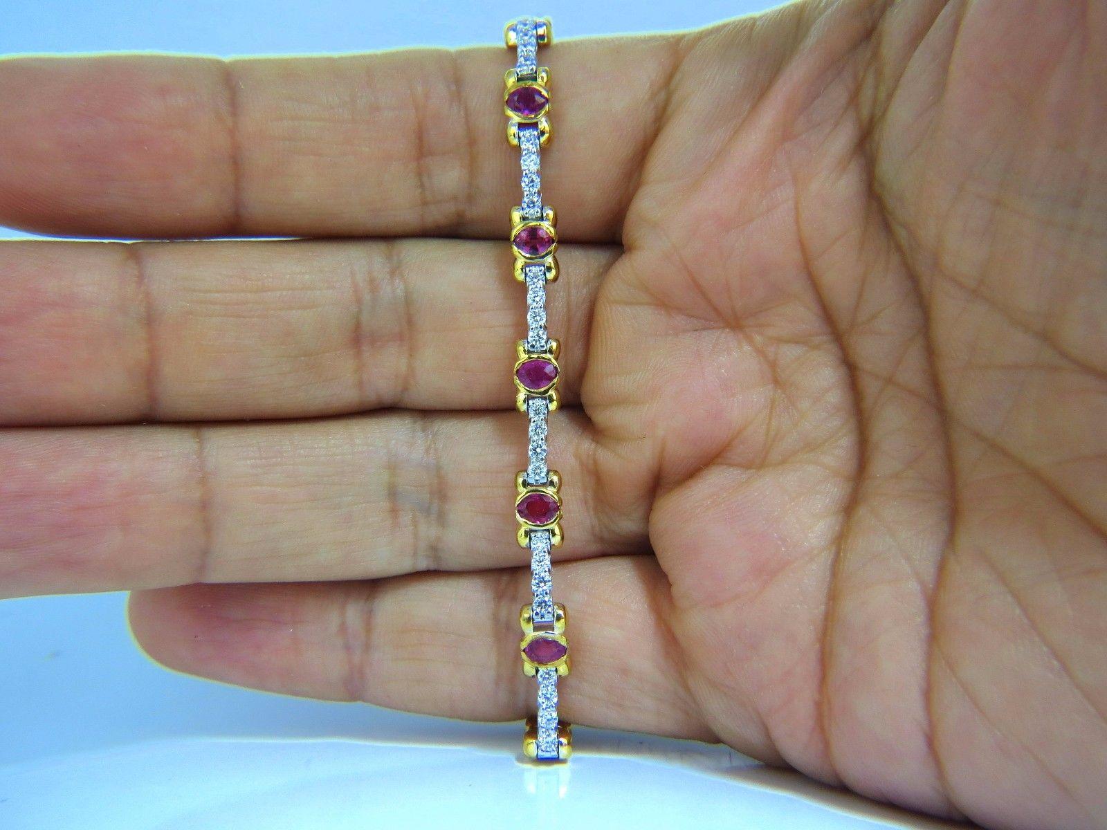 Classic Alternated Tennis / Two toned

2.50ct. Natural Ruby Tennis bracelet.

oval cuts, Fully Faceted.

Vivid Vibrant Red, excellent Sparkle.

Clean Clarity & Transparent.

3.4 X 2.2mm average each.

1.26ct. natural diamonds:

Rounds, Full