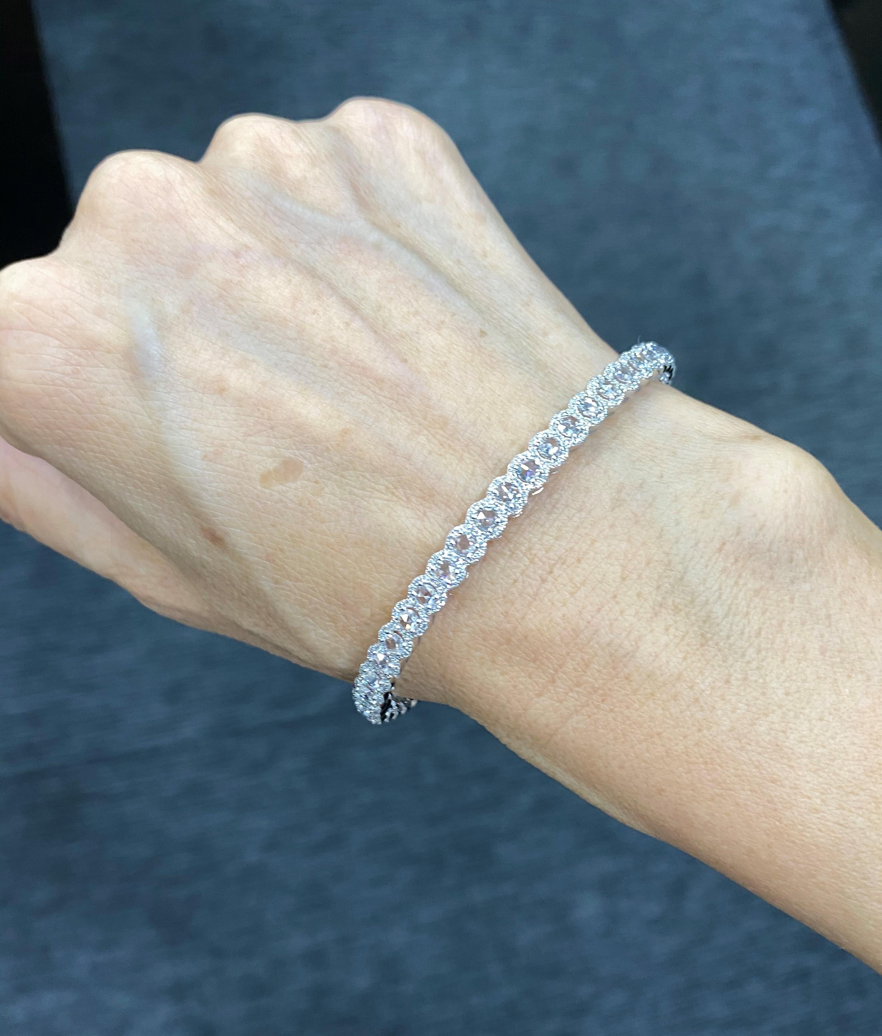 3.76 Carat Rose Cut & Round Diamond 18 Karat White Gold Bangle   

Our Rose Cut & Round Diamond bangle is extremely wearable. Its versatility and classic design make it a great accompaniment to various occasions. Beautifully made with calibrated