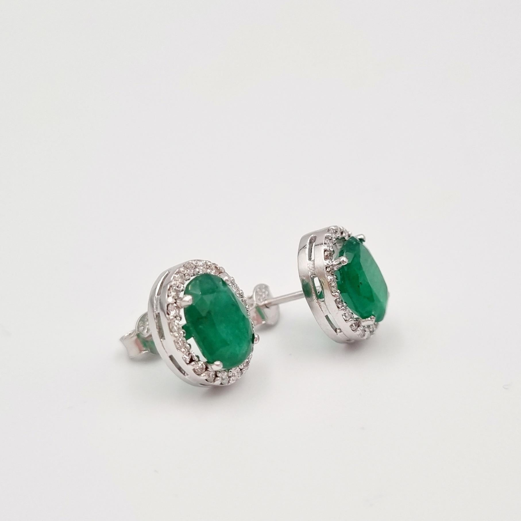 Oval Cut 3.76 Halo Emerald and Diamonds Stud Earrings For Sale