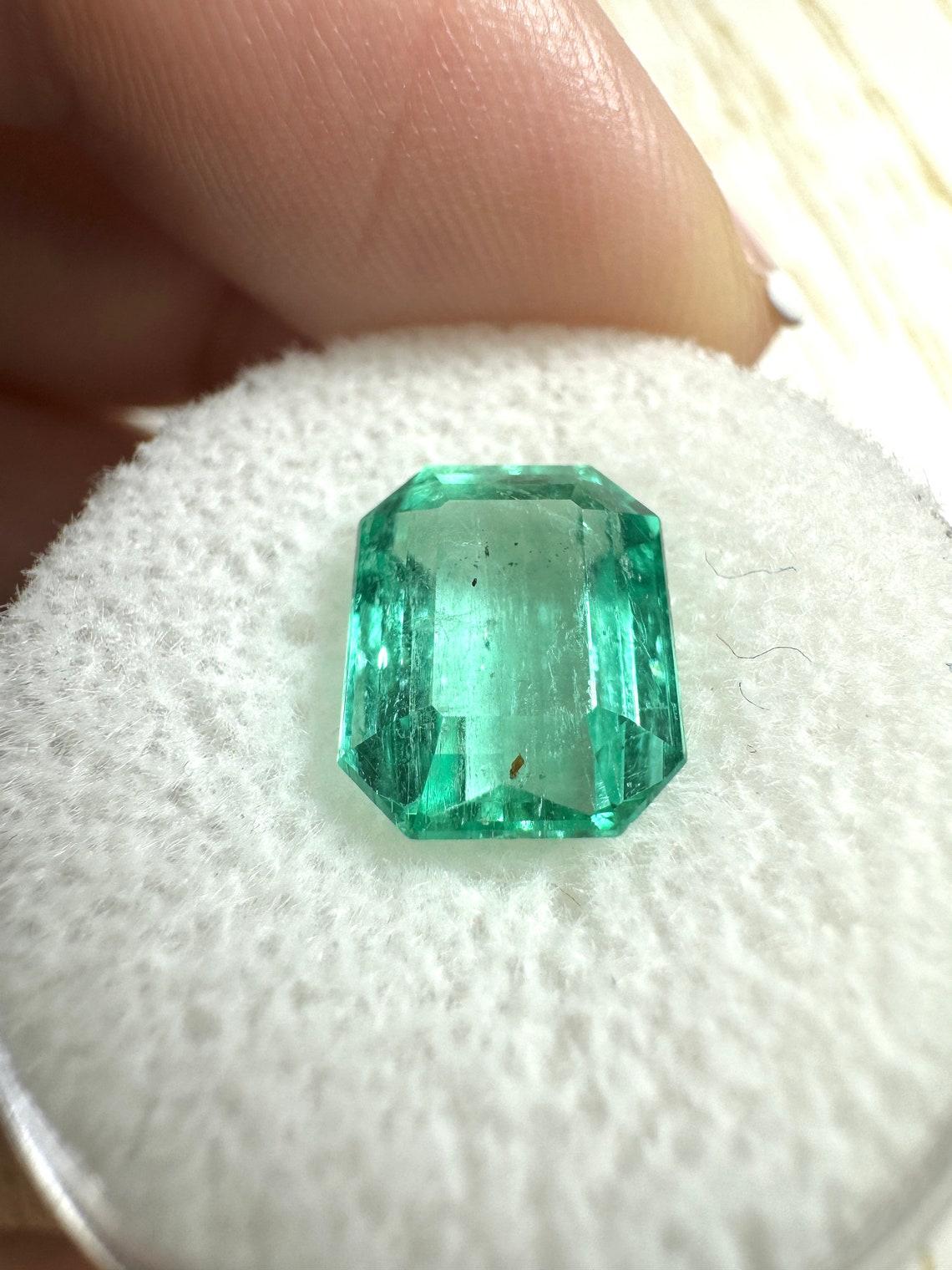 Stone: Emerald
Weight: 3.76-carats
Shape: Emerald Cut
Clarity: Transparent
Luster: Very Good
Color: Bluish Green
Measurements: 10.32mm x 8.34mm x 6.03mm
Geographic Origin: Colombia
Treatment: Natural, Oiling

Comments: Due to their growth conditions