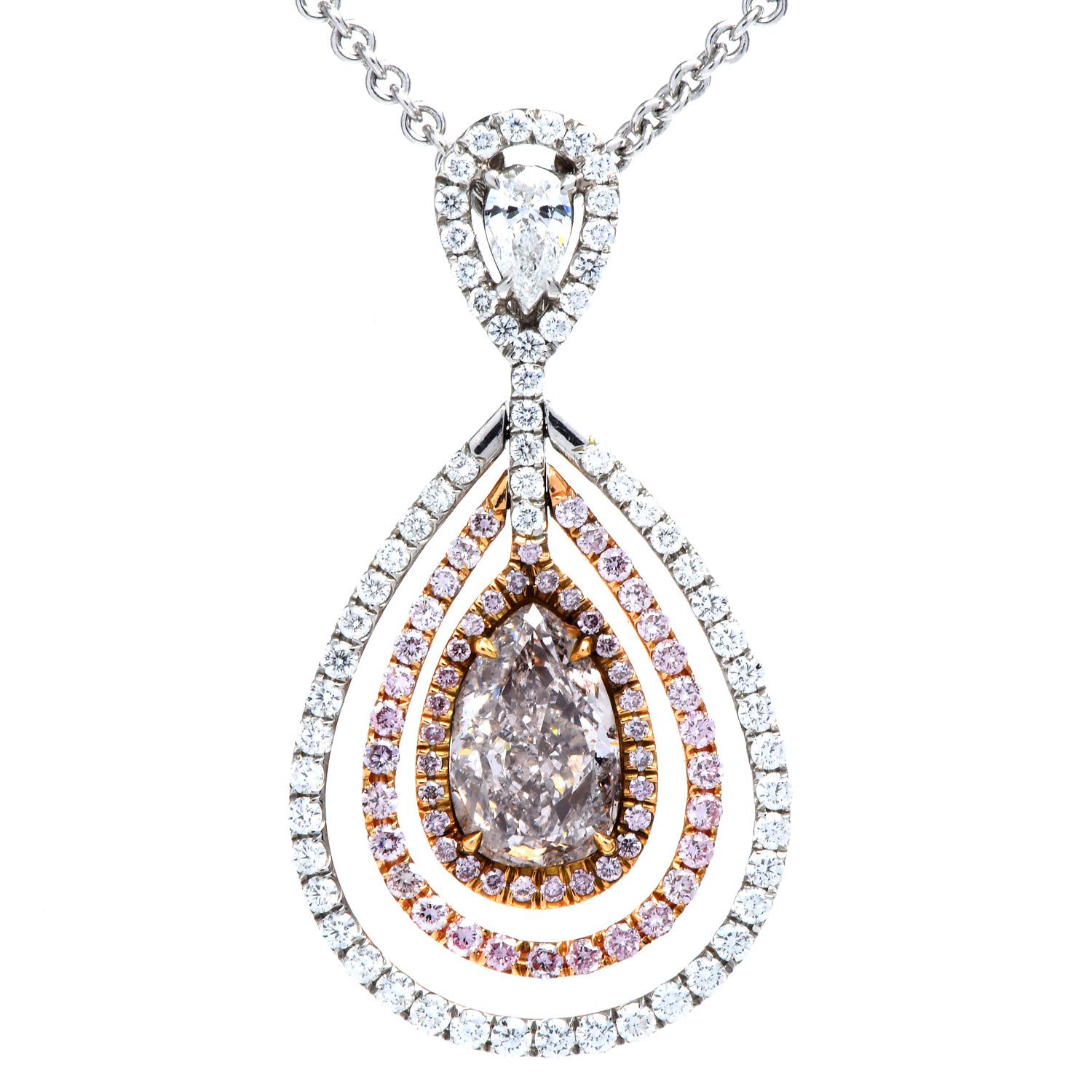 This stunning natural Fancy Natural light  Pink diamond pendant necklace is crafted in solid platinum and 18kWhite Gold.

It is centered by a GIA Certified pear-shaped natural Fancy light pink diamond, weighing 1.56 carats with SI2 Clarity, set in