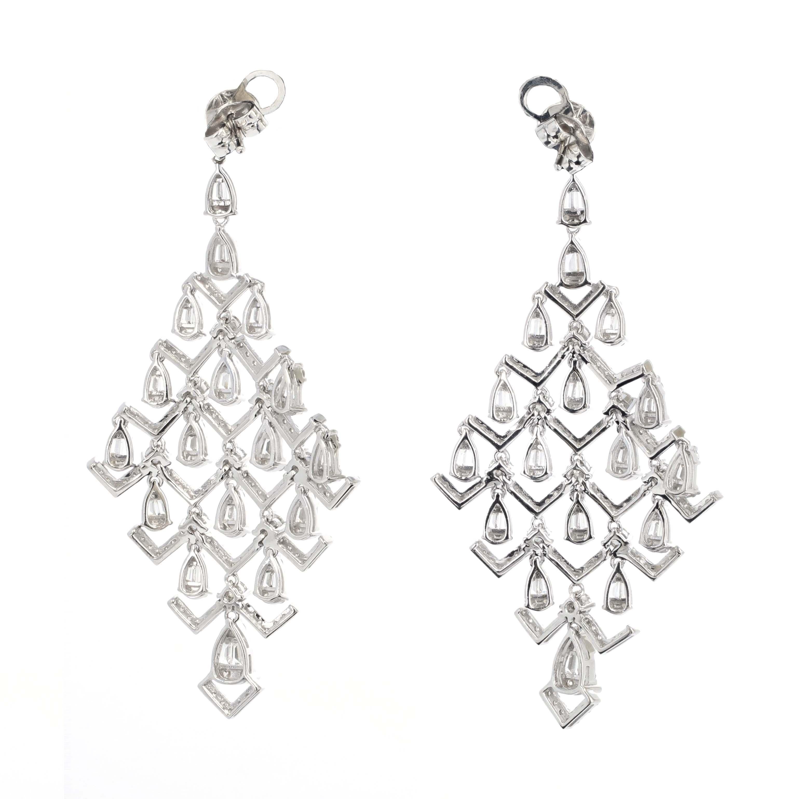 3.77-carat diamond chandelier dangling earrings in 18K white gold. These beautiful chandelier earrings are a perfect addition to any jewelry collection. They are crafted from smaller-cut diamonds beautifully placed together to give the illusion of