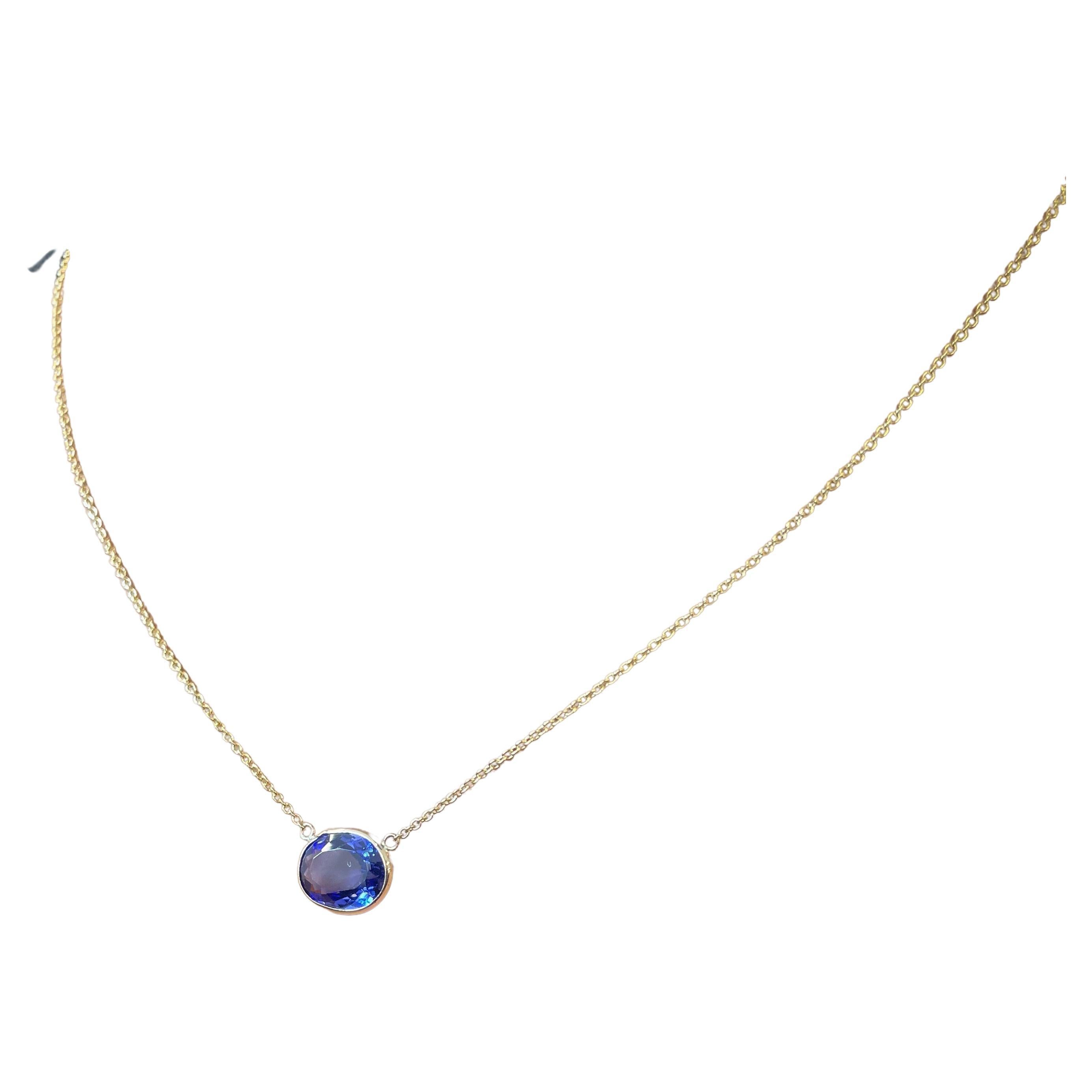 3.77 Carat Oval Blue Tanzanite Fashion Necklaces In 14k Yellow Gold  For Sale