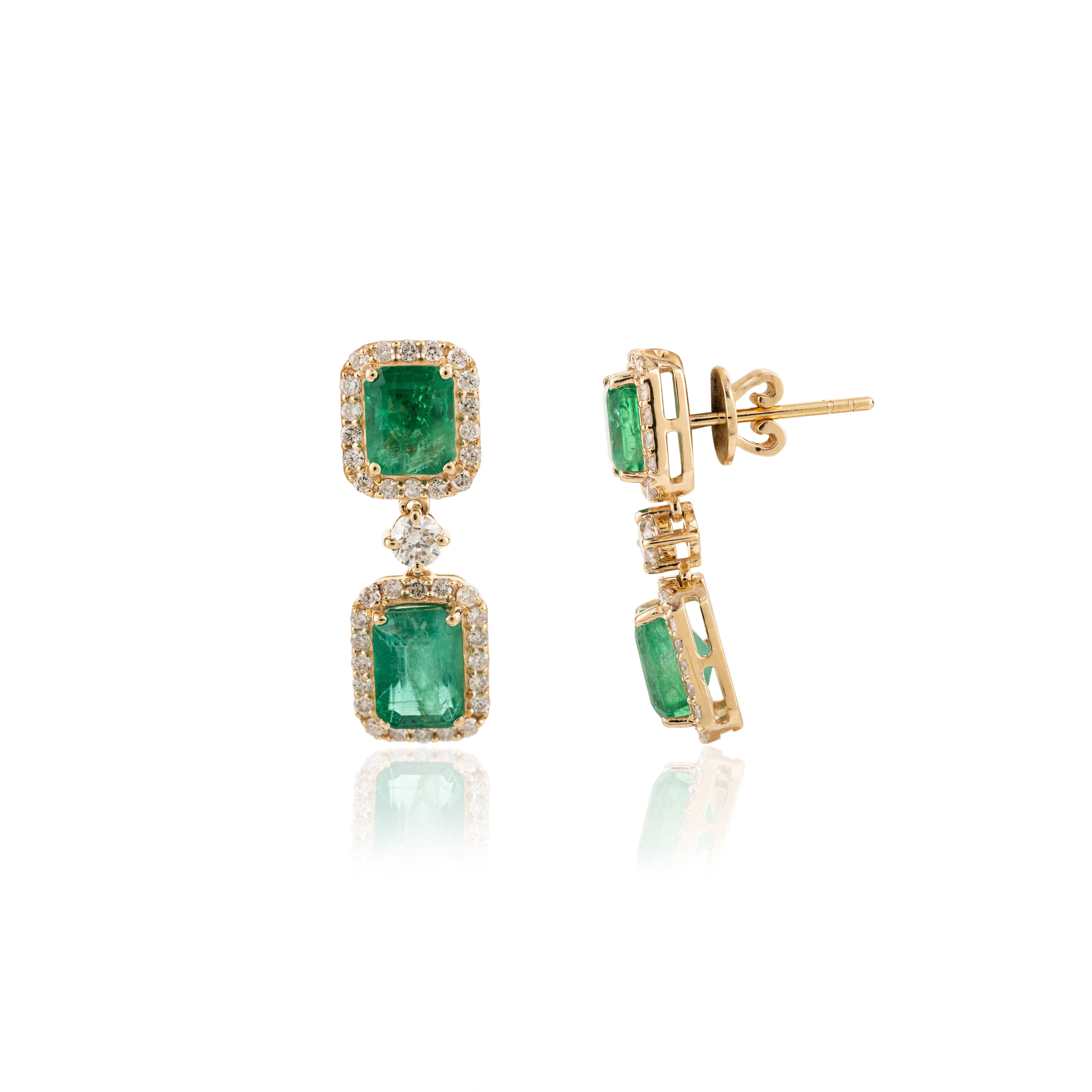 3.77 Carat Emerald May Birthstone Halo Diamond 18k Yellow Gold Dangle Earrings In New Condition For Sale In Houston, TX