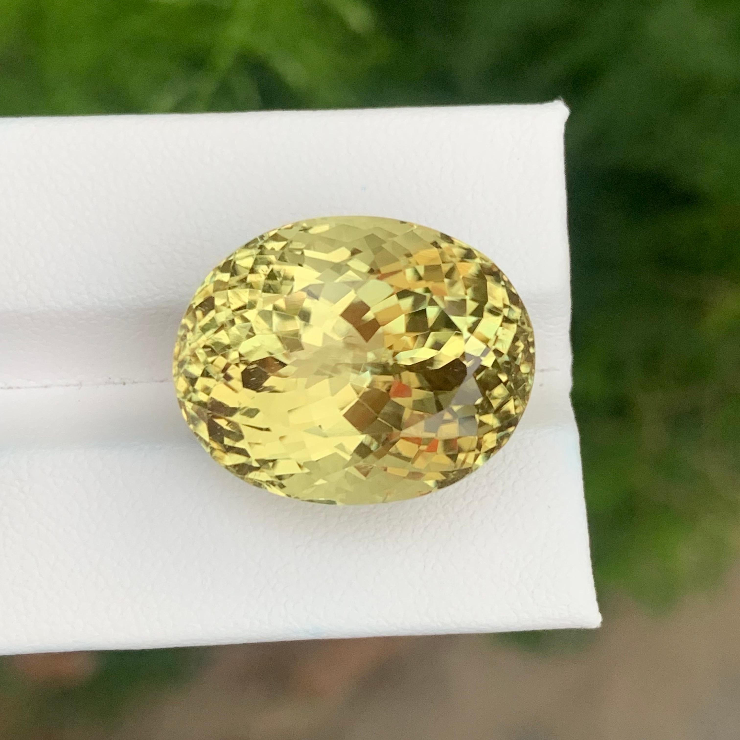 Women's or Men's 37.70 Carat Natural Loose Yellow Kunzite Oval Shape Gemstone For Sale