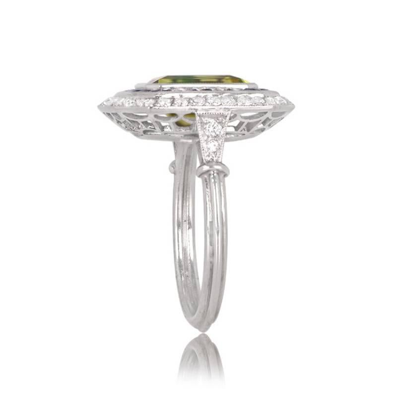 3.77ct Emerald Cut Peridot Cocktail Ring, Diamond & Sapphire Halo, Platinum In Excellent Condition For Sale In New York, NY