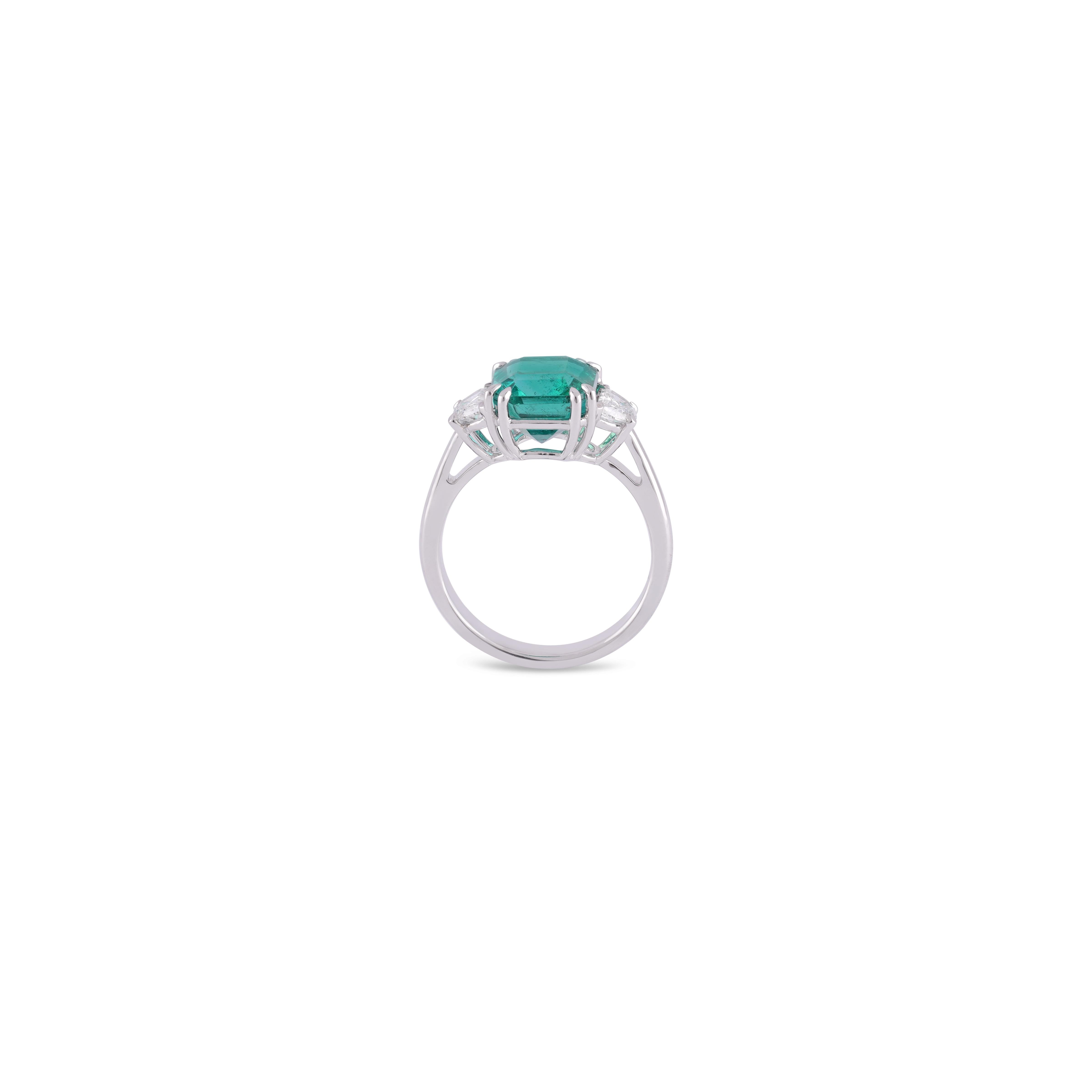 This is an elegant emerald & diamond ring studded in 18k gold with 1 piece of high  Zambian emerald weight 3.78 carat which is surrounded by 2 pieces of diamonds weight 0.58 carat, this entire ring studded in 18k White gold.
Apart of our carefully
