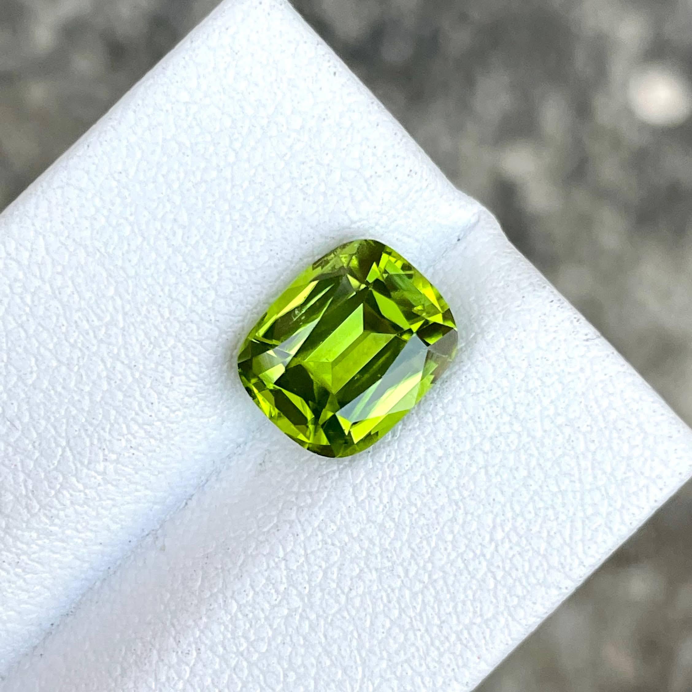 Weight 3.78 carats 
Dimensions 10.2x8.4x5.6 mm
Treatment none 
Origin Pakistan 
Clarity VVS 
Shape cushion 
Cut fancy cushion 



This exquisite 3.78 carat green Peridot gemstone is a stunning example of nature's artistry. Expertly cut into a