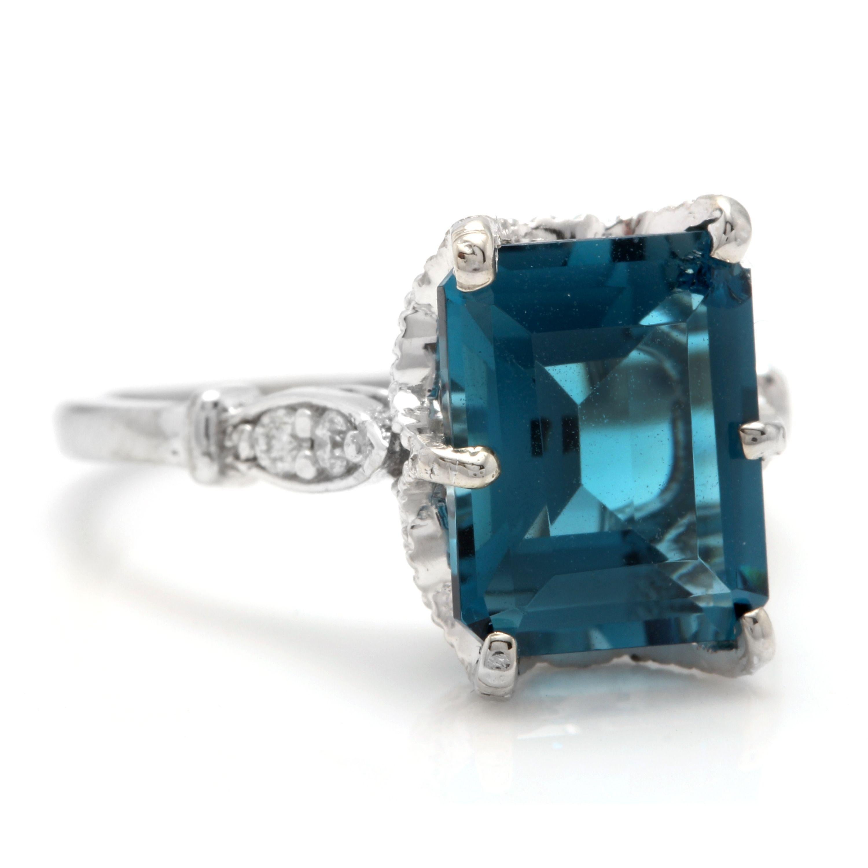 3.78 Carats Natural Impressive London Blue Topaz and Diamond 14K White Gold Ring

Total Natural London Blue Topaz Weight is Approx. 3.70 Carats

London Blue Topaz Measures: Approx. 10.00 x 8.00mm

Natural Round Diamonds Weight: Approx. 0.08 Carats