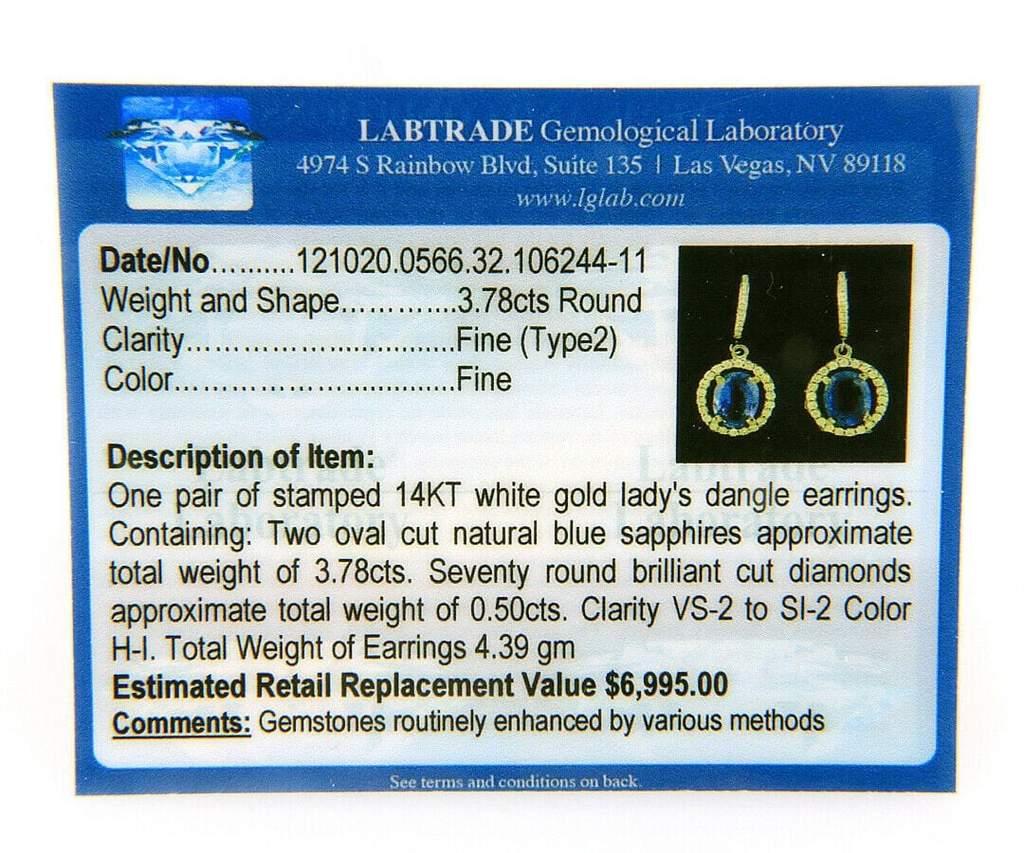 3.78ctw Oval Sapphire and 0.50ctw Diamond Frame Dangle Earrings in 14K

Oval Sapphire and Diamond Frame Dangle Earrings
14K White Gold
Sapphire Carat Weight: Approx. 3.78ctw
Clarity: Fine (Type 2)
Color: Fine
Diamonds Carat Weight: Approx.