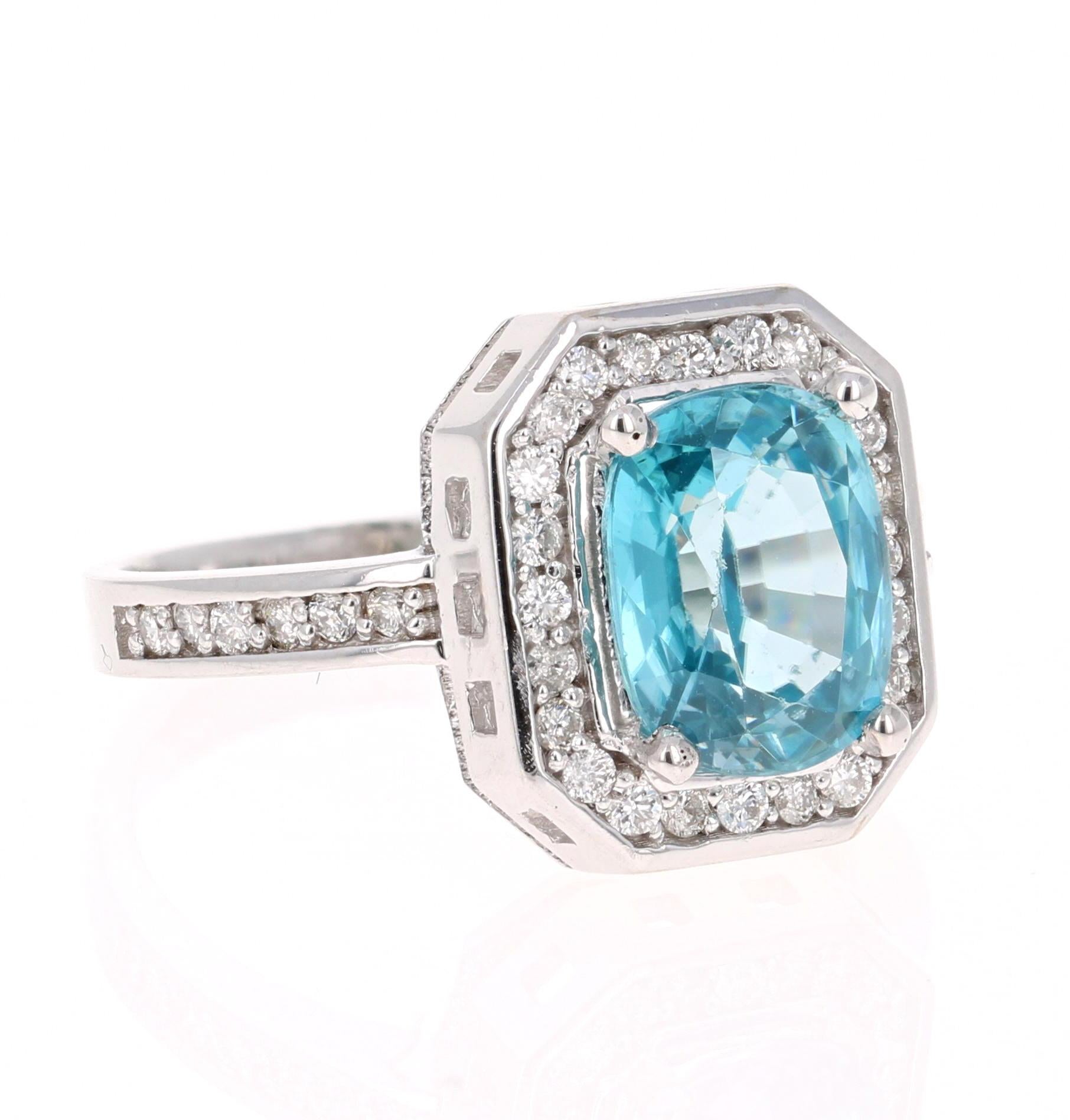 A beautiful Blue Zircon and Diamond ring that can be a nice Engagement ring or just an everyday ring!
Blue Zircon is a natural stone mined mainly in Sri Lanka, Myanmar, and Australia.  

This ring has a beautiful Oval Cut Blue Zircon that weighs