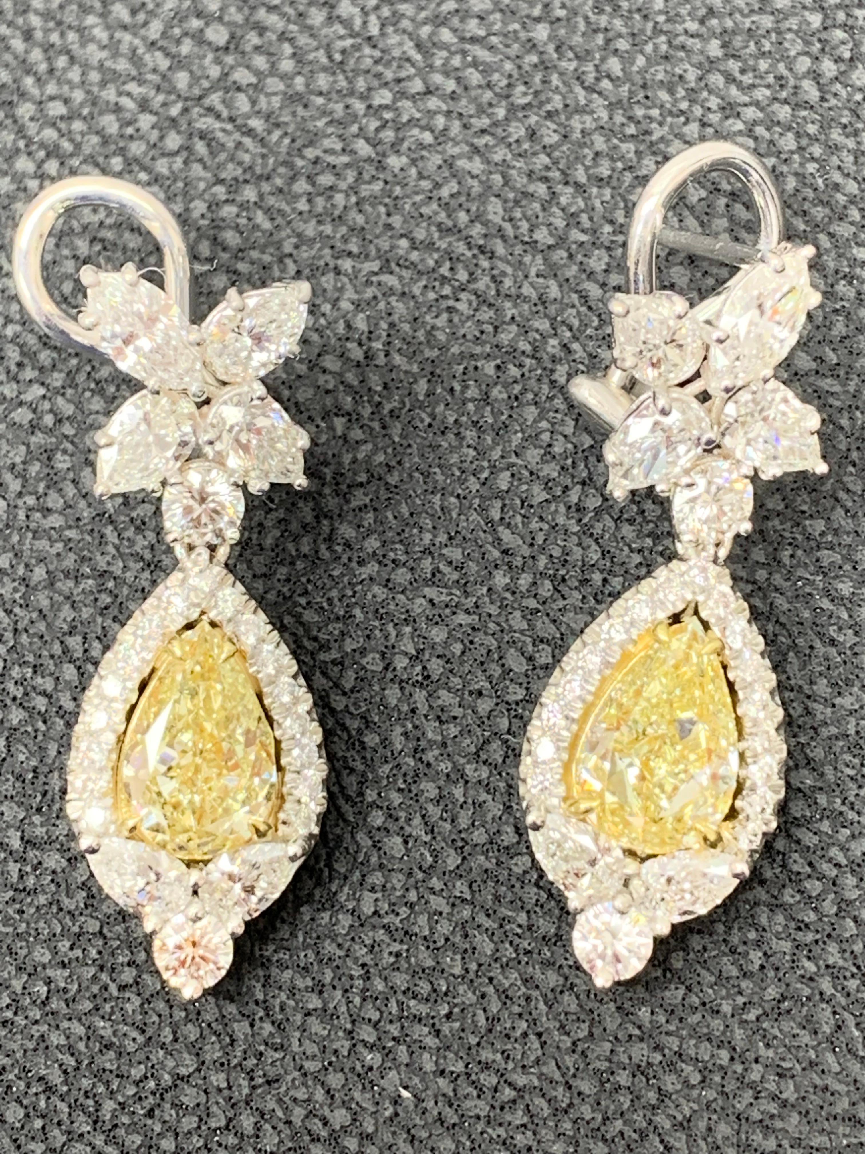Contemporary 3.79 Carat Fancy Yellow Diamond and Diamond Drop Earrings in 18K White Gold For Sale