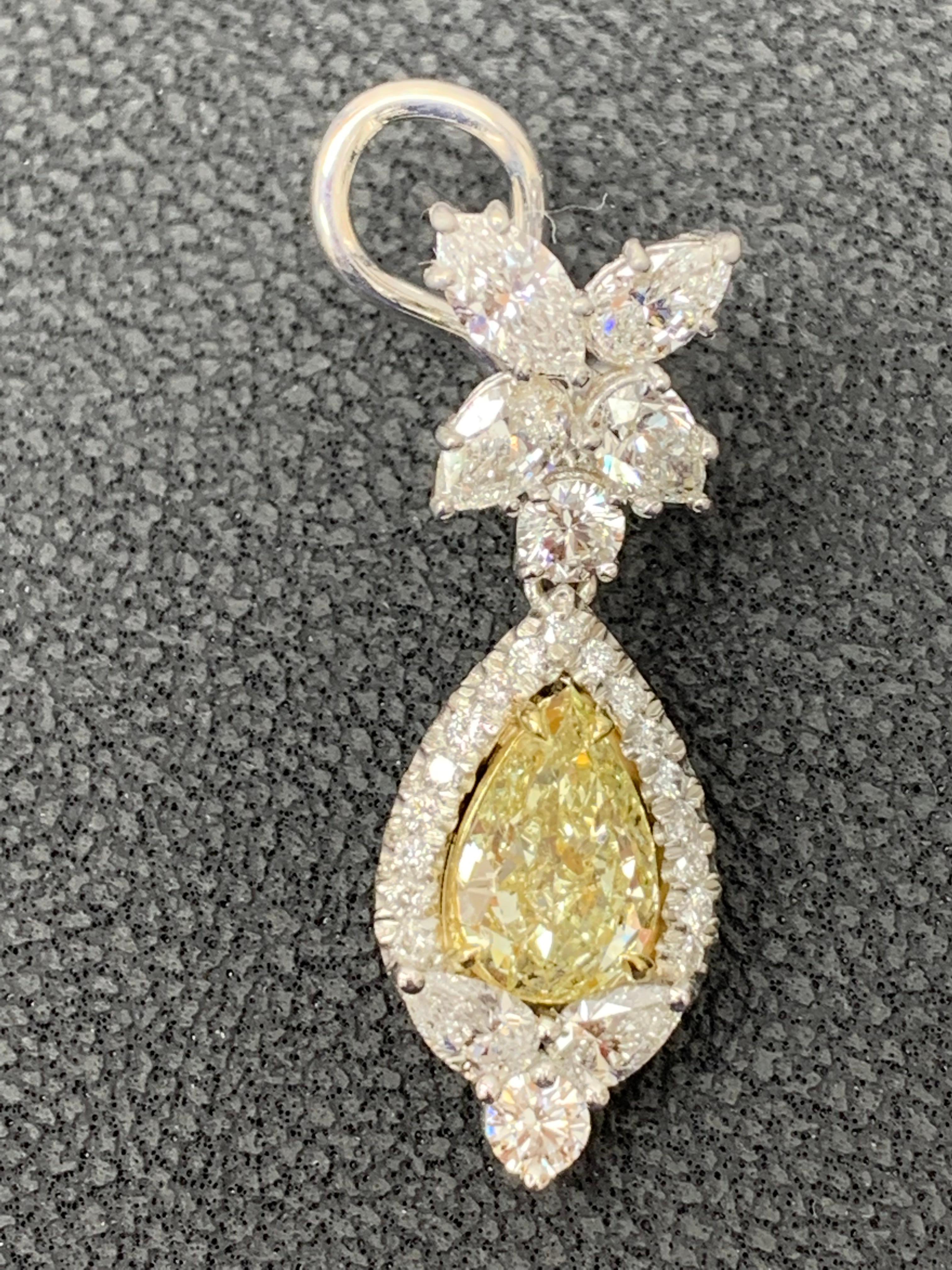 Pear Cut 3.79 Carat Fancy Yellow Diamond and Diamond Drop Earrings in 18K White Gold For Sale