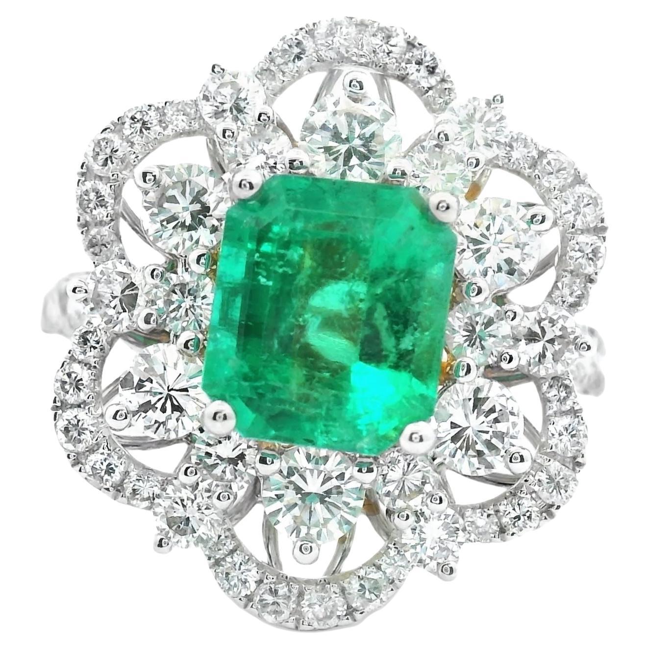 3.79 carat White Gold 18k Diamond and Emerald Ring