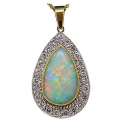 3.79ct Pear Shape Opal 
Diamond Cluster Pendant 18 Karat Yellow and White Gold