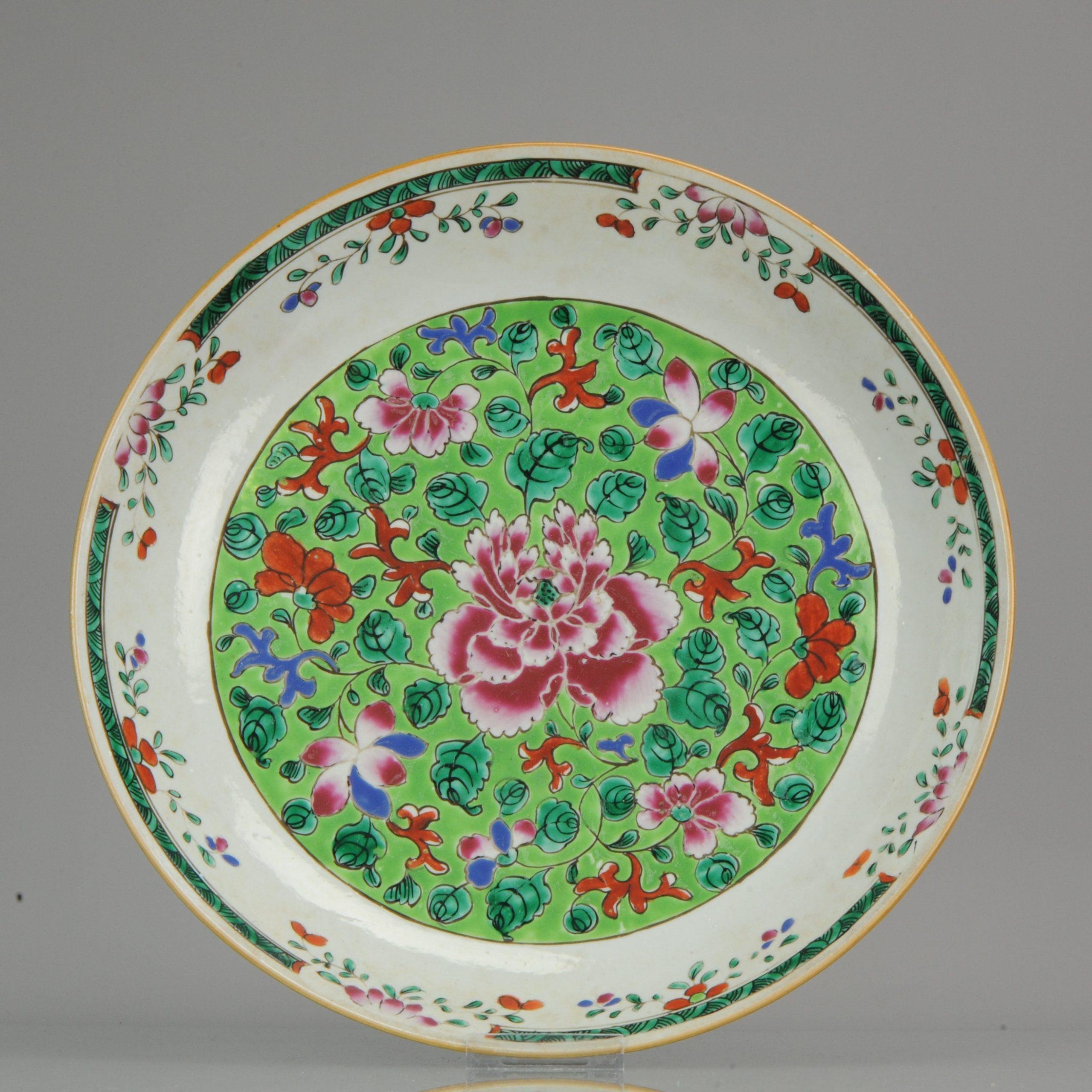 Lovely Chinese porcelain Famille Rose Charger with nice green enamels.

We think it could be a pre Bencharong / Pre Nyonya plate/charger. We call this style Pre Bencharong because it has many features of later bencharong / south East Asian wares,