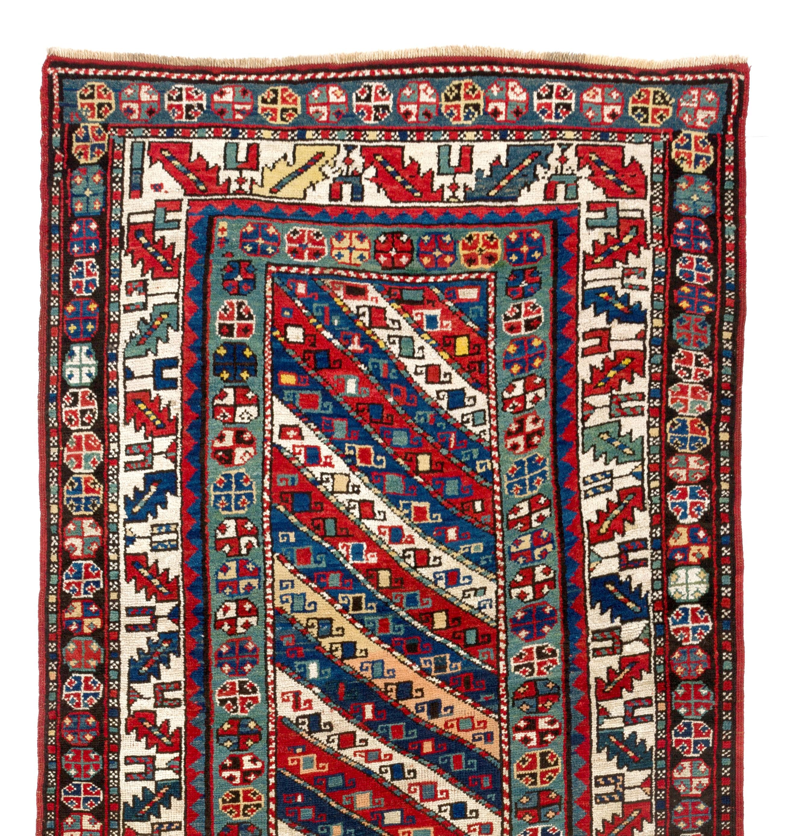 Antique Caucasian Gendje Kazak rug with beautiful natural dyes. Finely hand-knotted with even medium wool pile on wool foundation. Very good condition. Sturdy and as clean as a brand new rug (deep washed professionally). Measures: 3.7 x 7.2 ft.