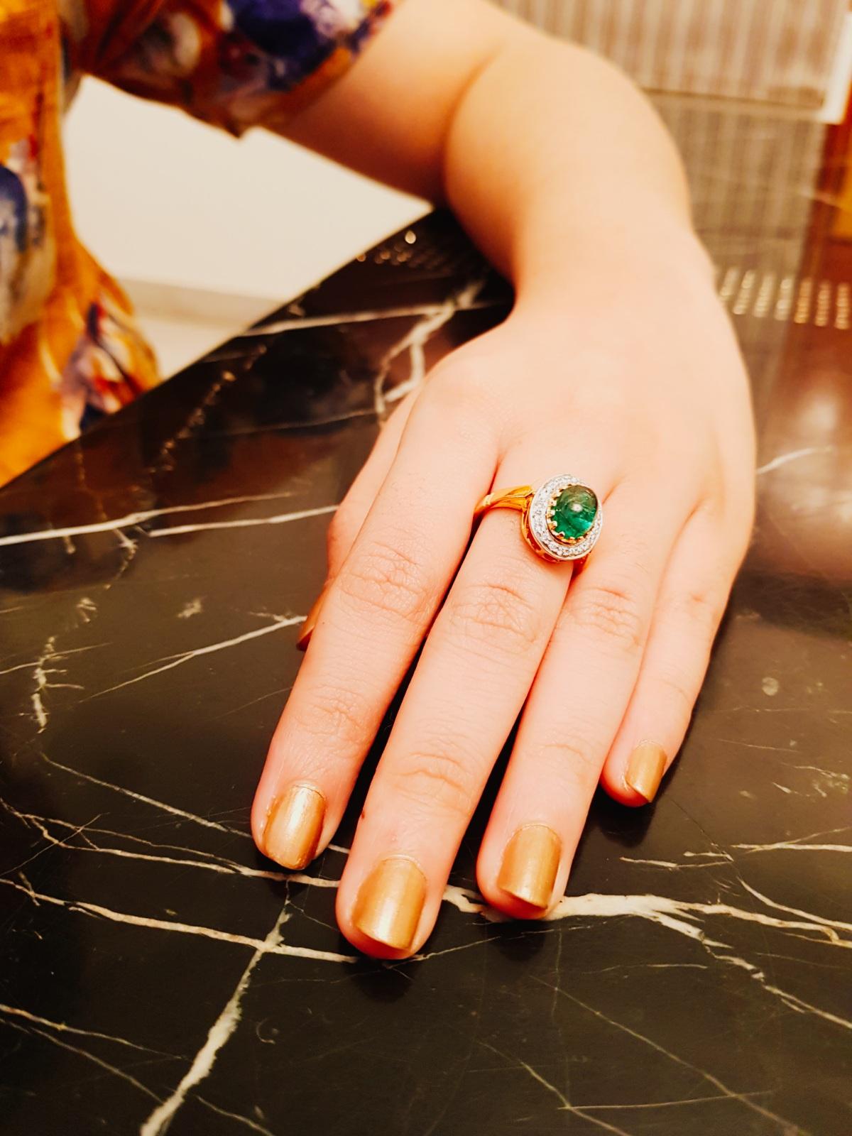 Oval Cut 3.8 Carat Emerald 0.75 Carat Diamond Ring