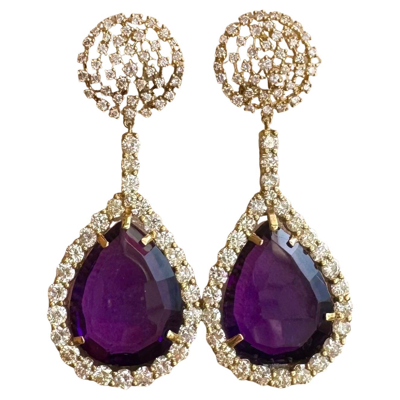 Approximately 38 Carat  Natural Amethyst  & Diamond Cocktail  Earring , 18 Karat Yellow Gold
Very desirable color and quality.
perfect pair made in 14 Karat Yellow gold
Weight f the Earring is 31 Grams
 Diamonds: approximate 9 ct 
very clean diamond
